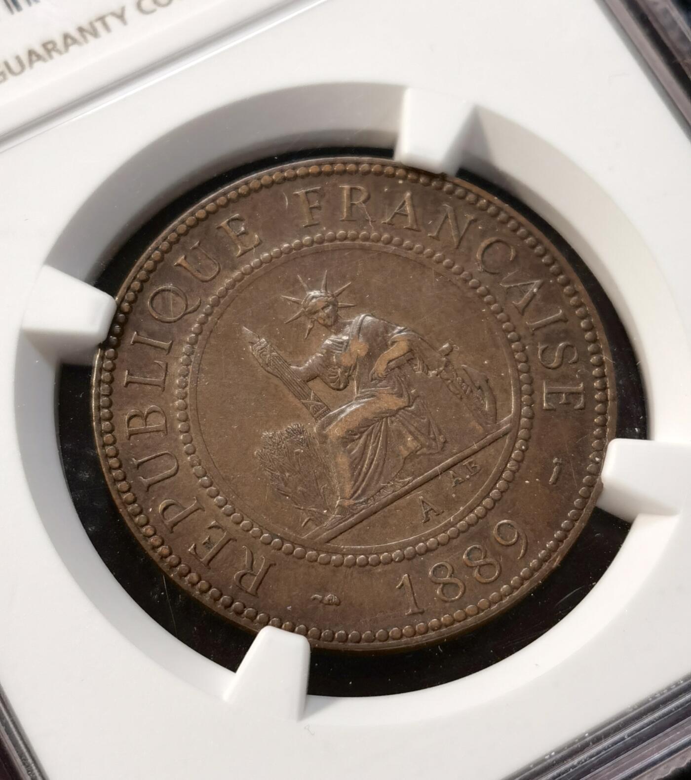 甄臻铺-世界币章拍卖（第37期），送拍享返佣金等优惠多多 NGC-AU55BN 法属印支 1889年A 坐洋一分 百分之一铜币