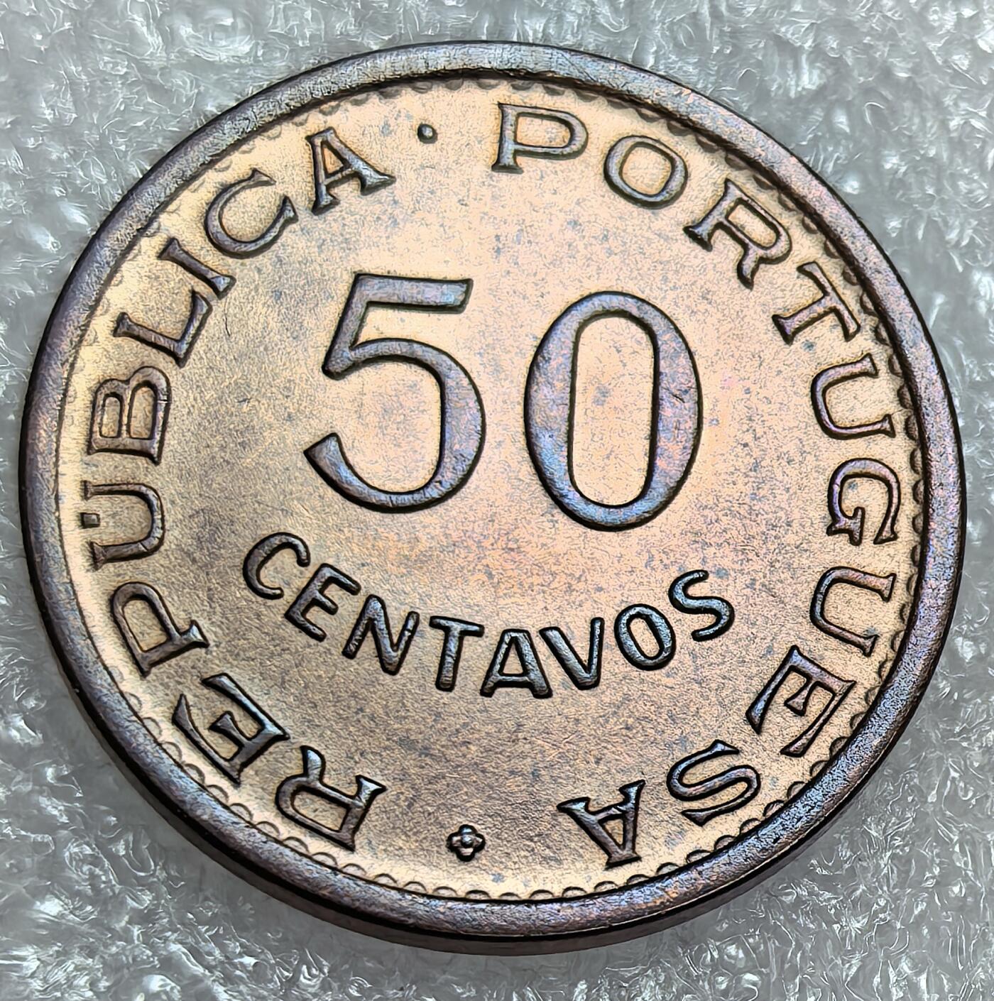 埃及、德属东非、匈牙利、葡萄牙、沙俄古银币古铜币，周五晚上九点倒数截拍，满百包邮，可寄存半年，喜欢朋友微信扫描二维码可直接参拍 UNC品相东帝汶1970年50分km18