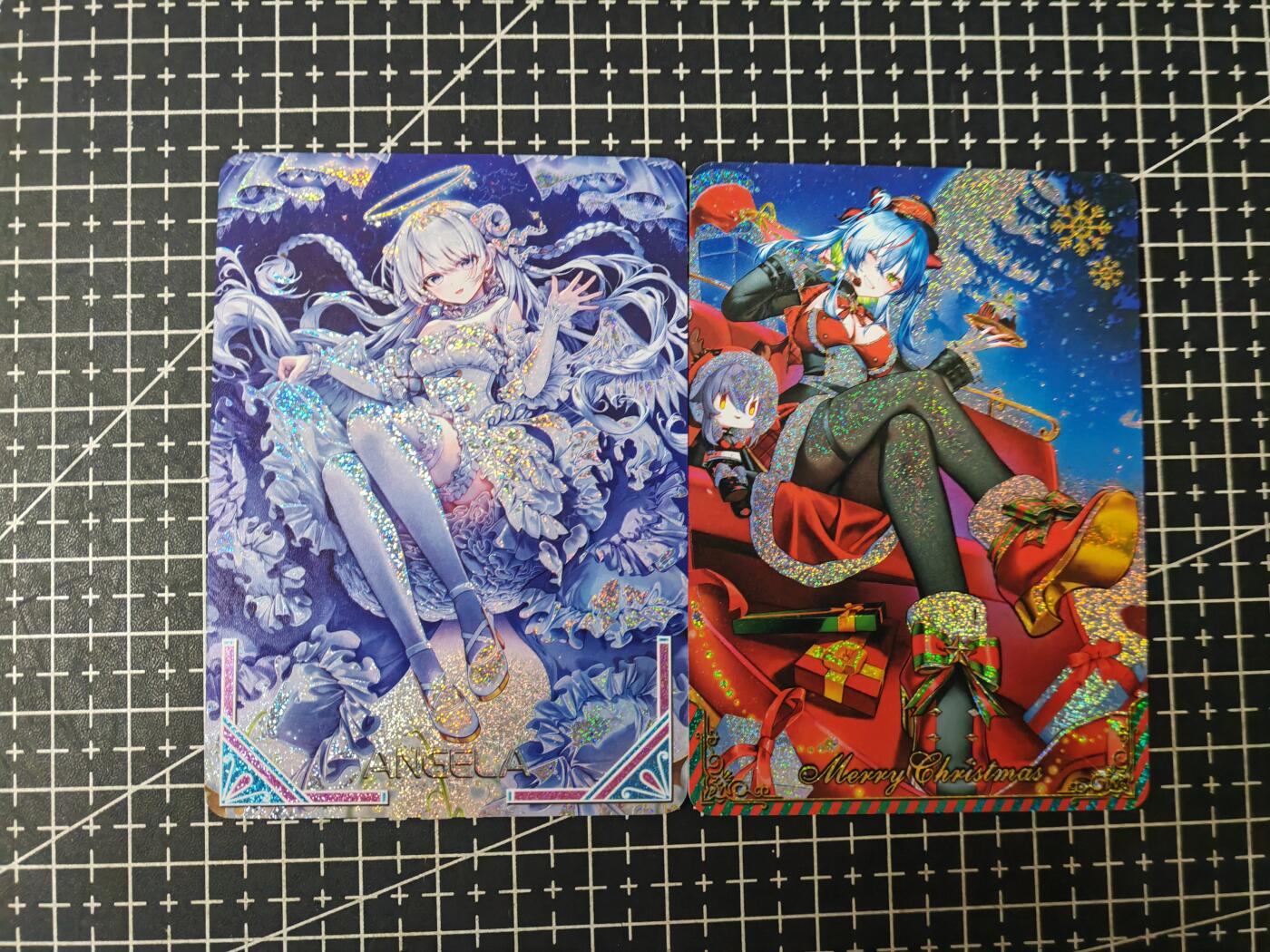 铃鹿第九期（提示一：自制卡难免瑕疵，可能存在撞角爆边等出厂瑕疵，介意慎拍；提示二：参拍请慎重，跑单押金不退的）） 圣诞美女彩闪对卡