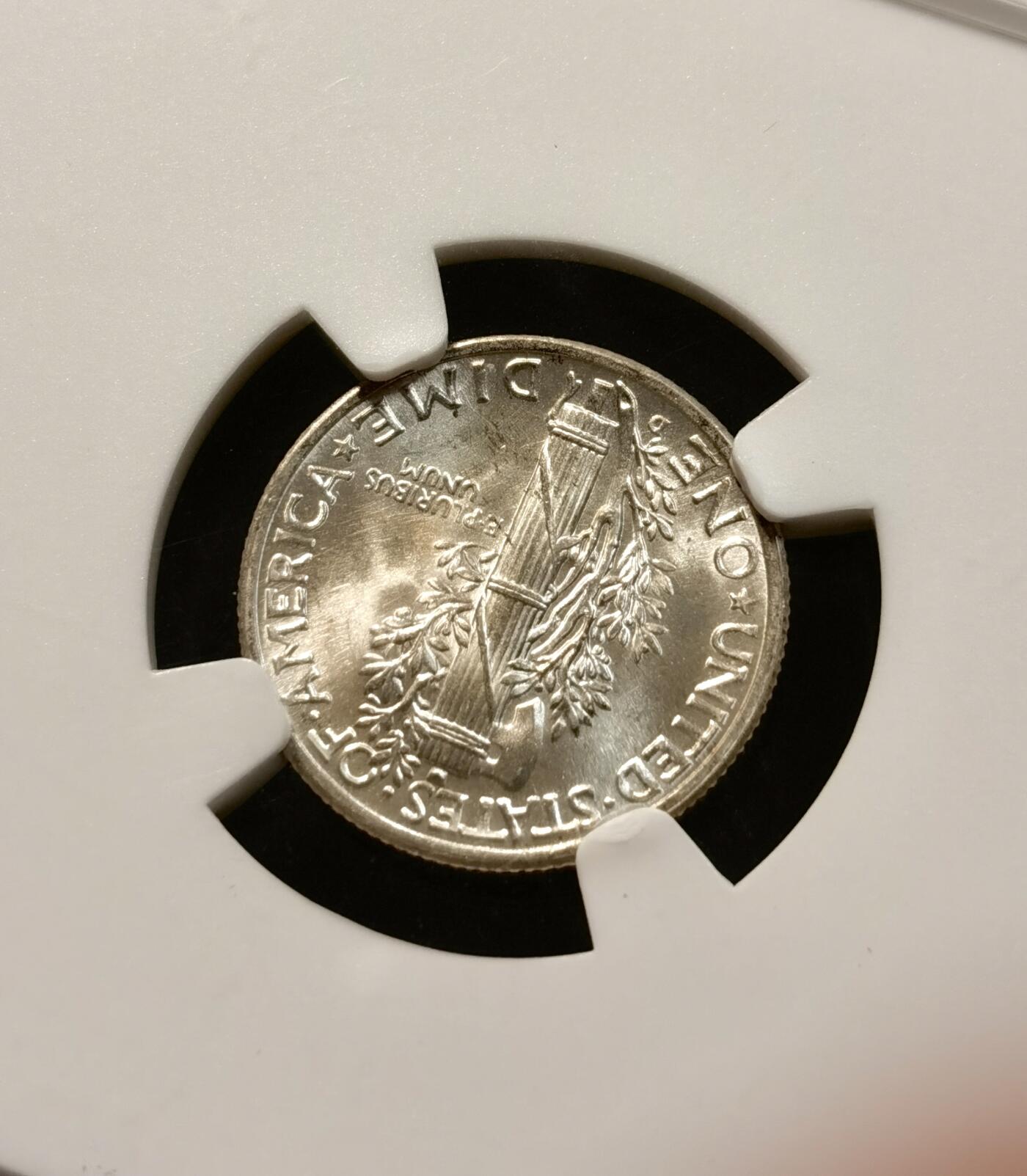 甄臻铺-世界币章拍卖（第37期），送拍享返佣金等优惠多多 NGC-MS66FB 1944年D版小飞侠，高分，FB后缀少见