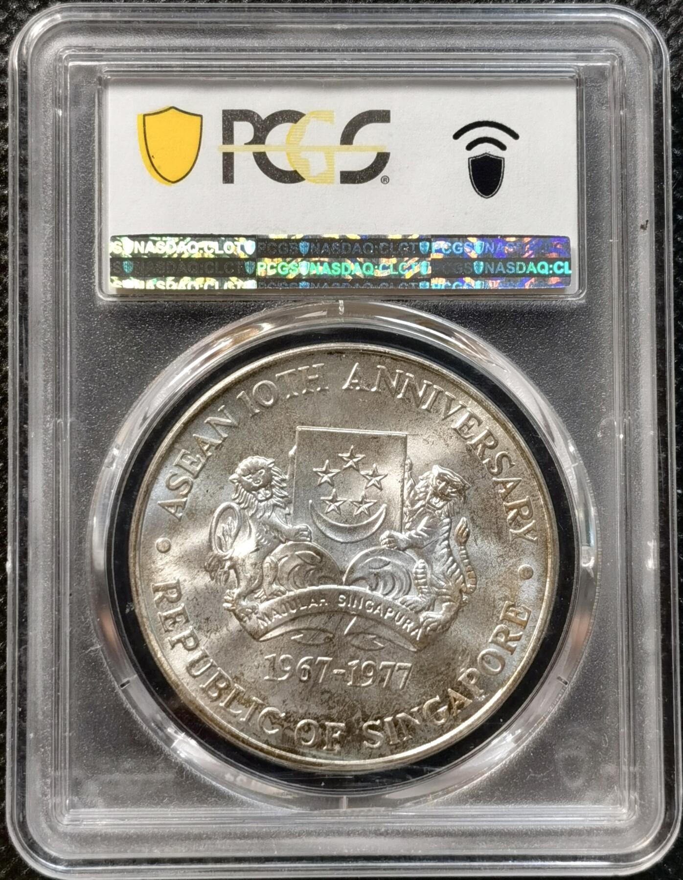 甄臻铺-世界币章拍卖（第37期），送拍享返佣金等优惠多多 PCGS-MS66 新加坡1977年10元精制银币 转光 1967-1977纪念东盟成立10周年