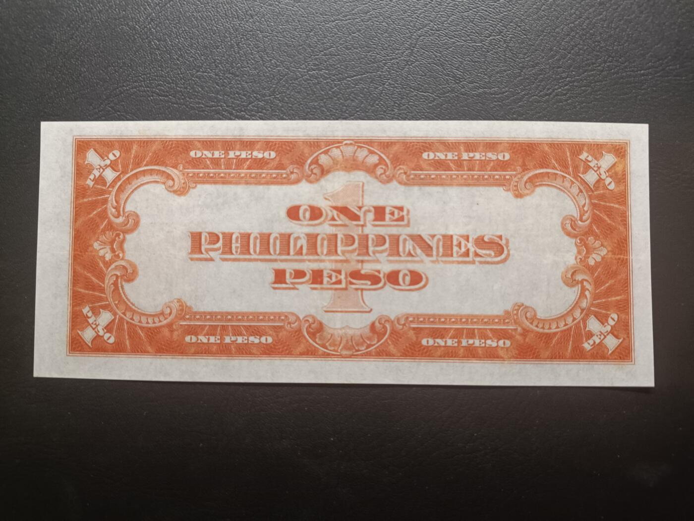 2025十一月第一期，总199期 菲律宾自治领1936版1比索AUNC长号无4，独立领袖马比尼，浓厚的美国钞票风格，此时菲律宾比索也与美金等值，故价值会比1937年与美金脱钩后同面值贵