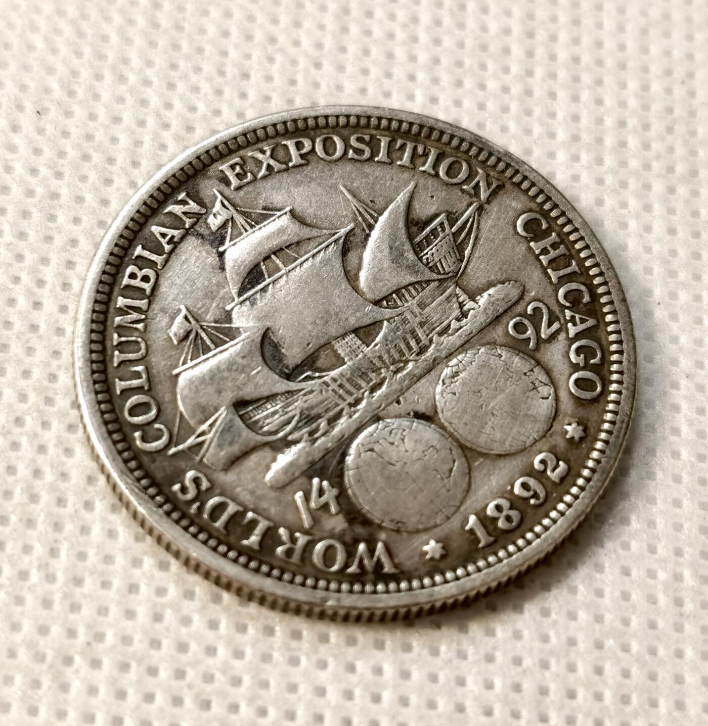 甄臻铺-世界币章拍卖（第37期），送拍享返佣金等优惠多多 美国1892年哥伦布50分银币 比1893年的要少很多