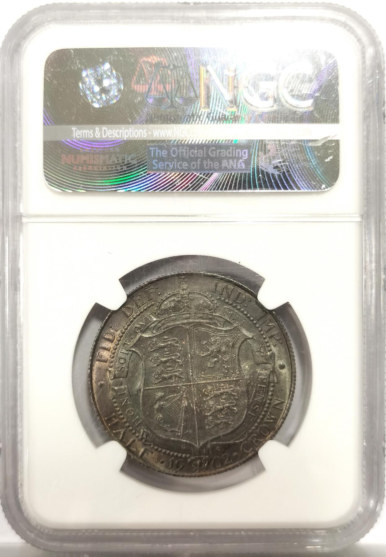 博洋堂世界钱币拍卖第144期（全场包邮） NGC MS62 1902年英国爱德华七世半克朗银币 极致黑色五彩包浆，光下仿佛浓浓乌云中的彩虹一般绚丽，视觉效果极为出色。同分白币成交价普遍超过1500元，此枚如此状态极为难得