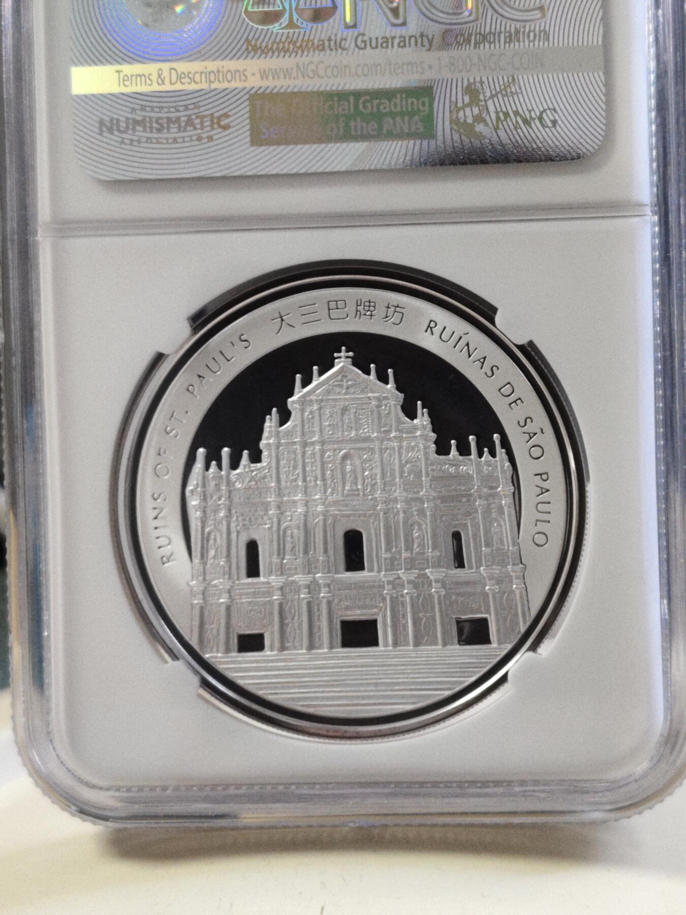 第180期拍卖【长期征集拍品】【北京币展专场】 2013年澳门生肖蛇年一盎司银币，NGC68分高分特别标注，背面大三巴牌坊，无盒无证书