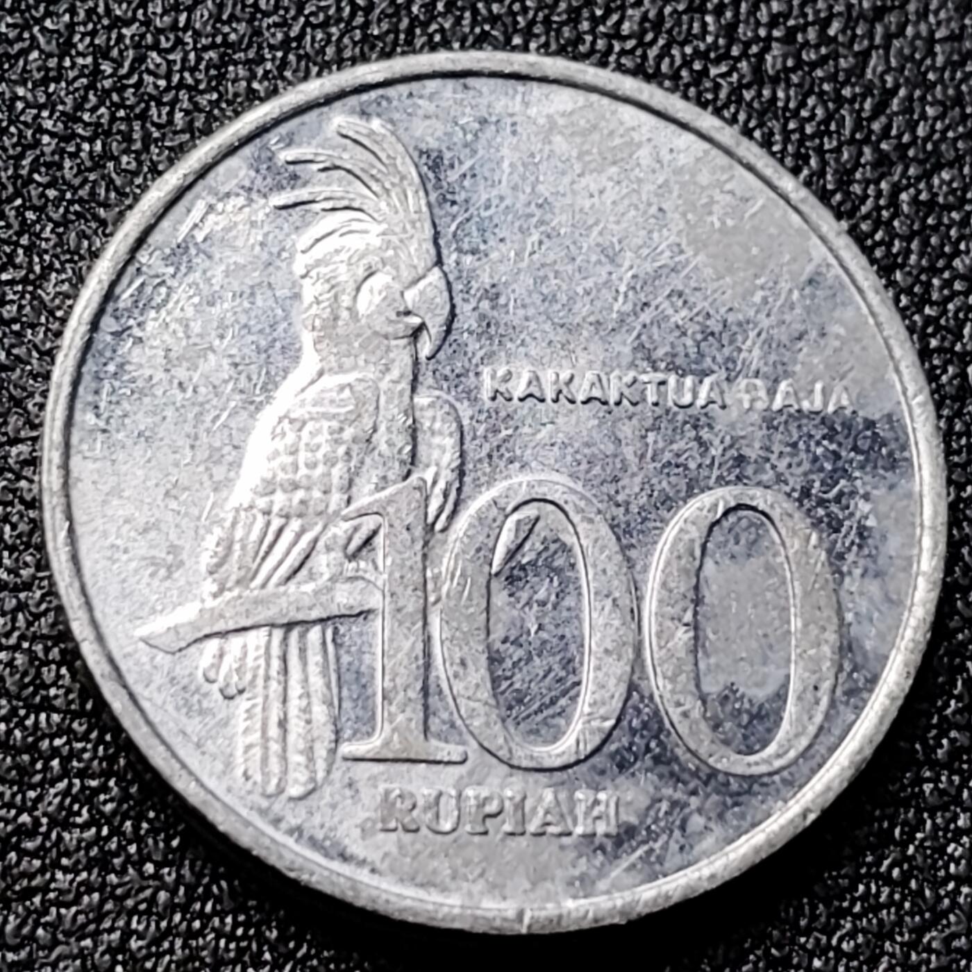 泉币菌-第120场-精品福利场 印度尼西亚100卢比铝币 凤头鹦鹉 23mm