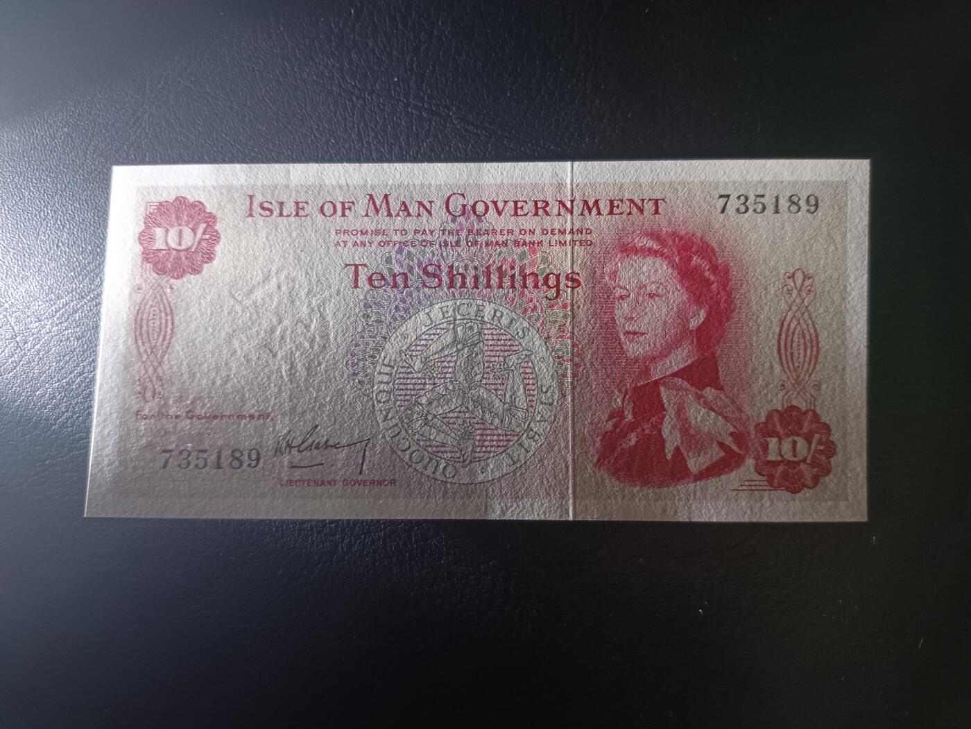 2025十一月第一期，总199期 马恩岛1961版10先令AUNC，戎装女王和传统帆船，早期旧币值品种