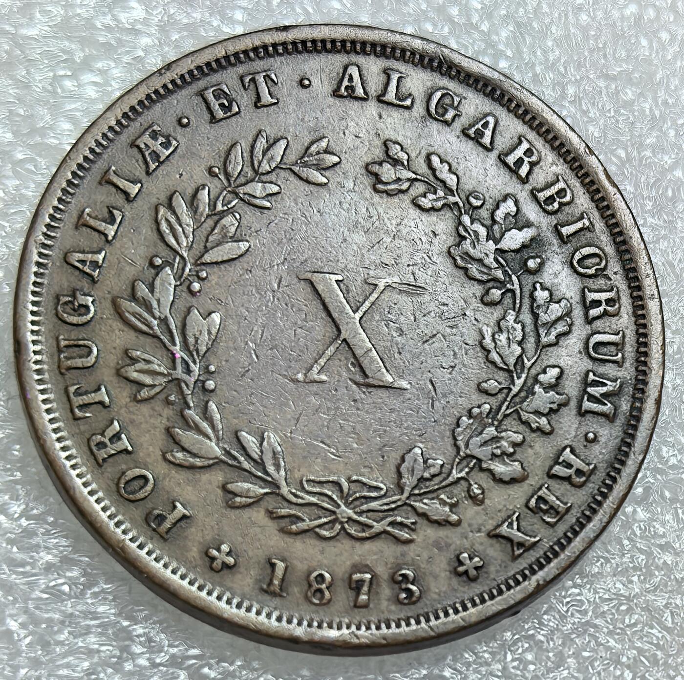 埃及、德属东非、匈牙利、葡萄牙、沙俄古银币古铜币，周五晚上九点倒数截拍，满百包邮，可寄存半年，喜欢朋友微信扫描二维码可直接参拍 好品相不多葡萄牙1873年10瑞斯，km514