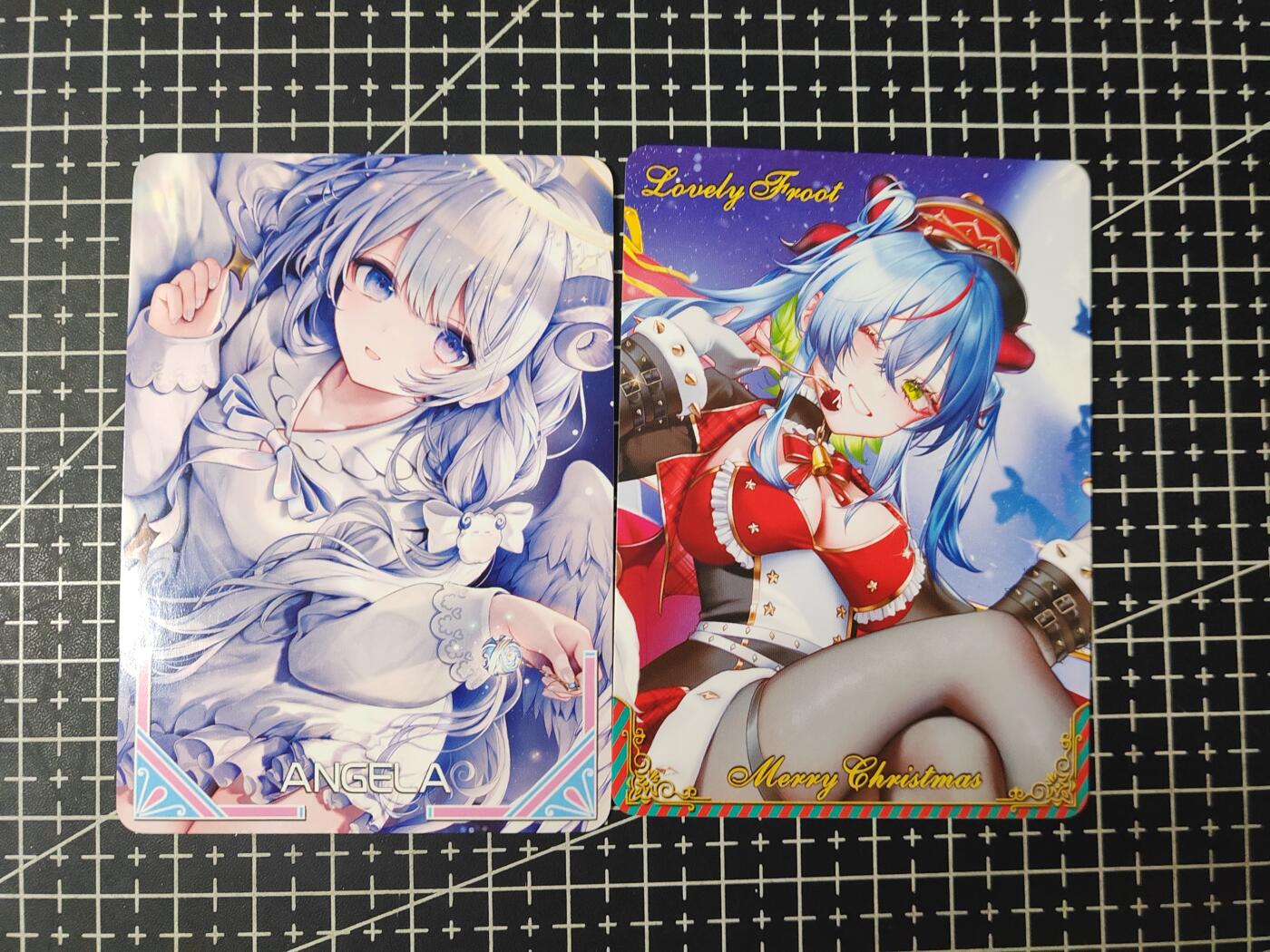 铃鹿第九期（提示一：自制卡难免瑕疵，可能存在撞角爆边等出厂瑕疵，介意慎拍；提示二：参拍请慎重，跑单押金不退的）） 圣诞美女彩闪对卡