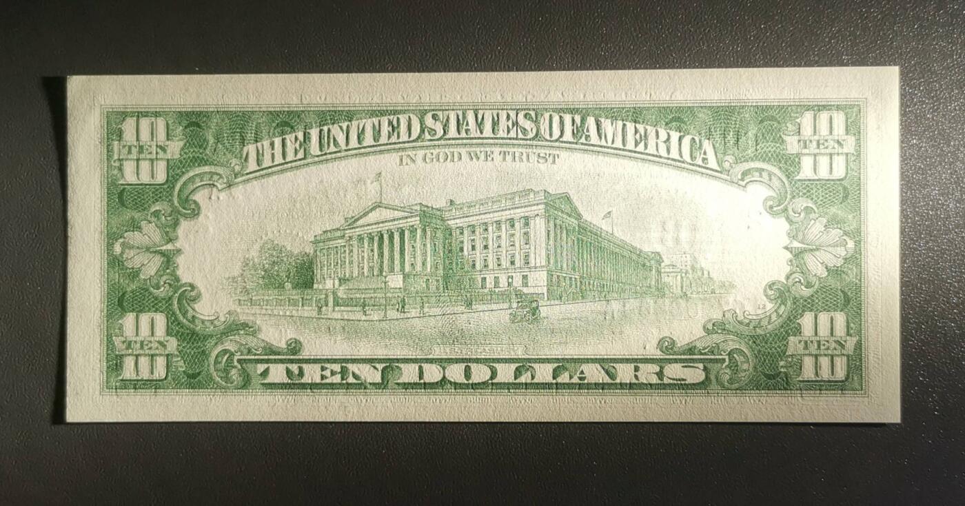 《艾美收藏》第218期-11.2周日外币荟萃 美国1963A版小头10美元UNC无4