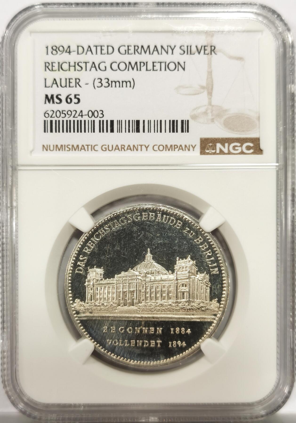 博洋堂世界钱币拍卖第144期（全场包邮） NGC MS65 1894年德国德意志帝国国会大厦落成纪念银章，极为完美的状态，纤毫毕现的将国会大厦刻在章中，强镜面效果强浮雕状态，视觉效果极佳，与精制币别无二致，国内公开市场此前所见最高分是62分（含佣金近2600元成交）此枚65分遥遥领先，遍查海外拍卖此枚分数最高，n无显示但应为冠军分数