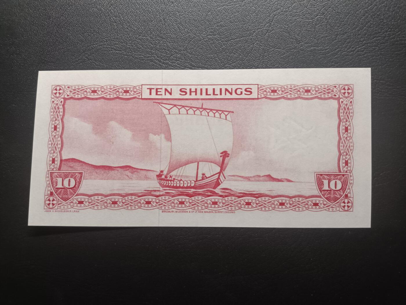 2025十一月第一期，总199期 马恩岛1961版10先令AUNC，戎装女王和传统帆船，早期旧币值品种