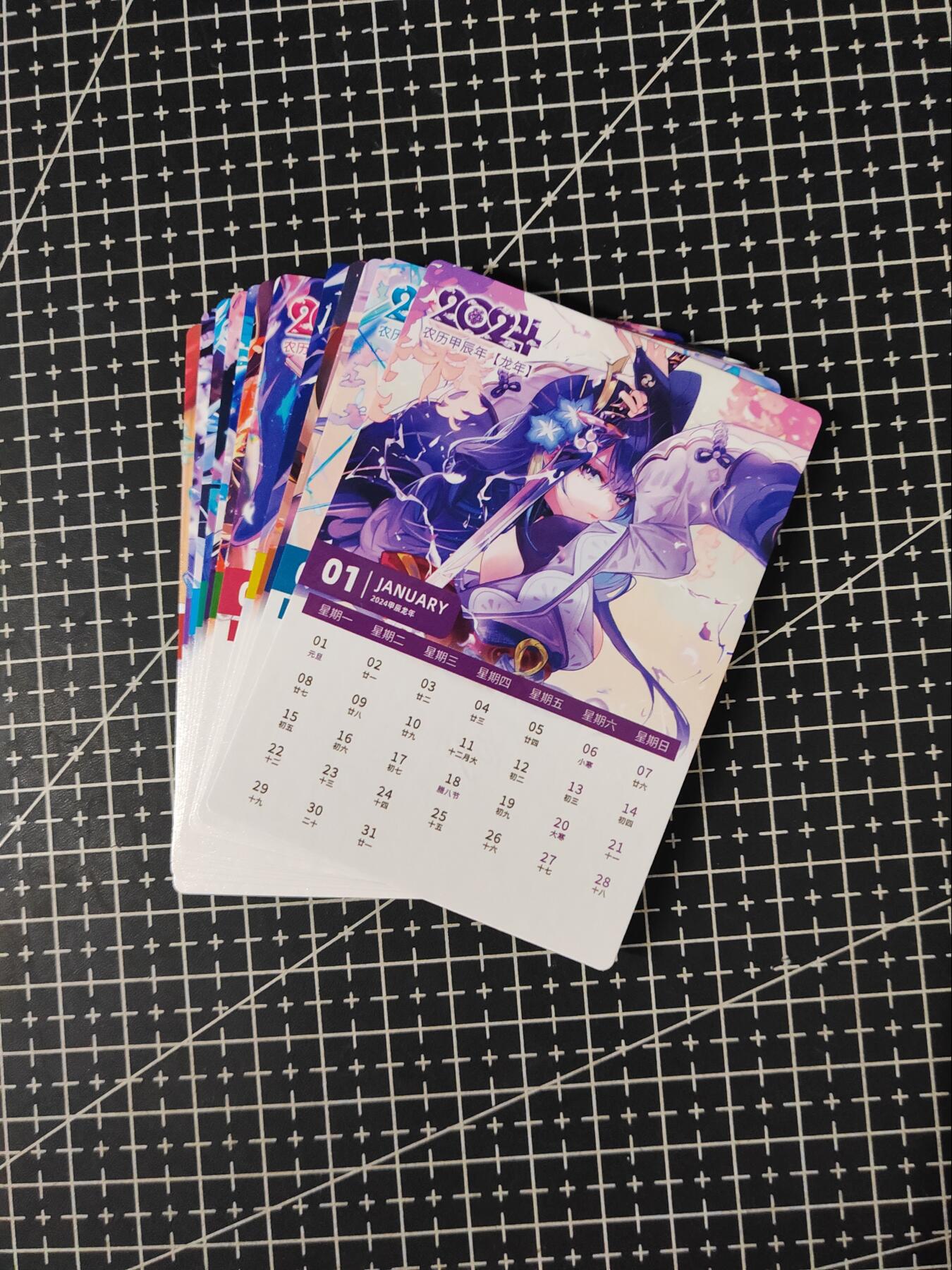 铃鹿第九期（提示一：自制卡难免瑕疵，可能存在撞角爆边等出厂瑕疵，介意慎拍；提示二：参拍请慎重，跑单押金不退的）） 原神年历粗闪烫红套