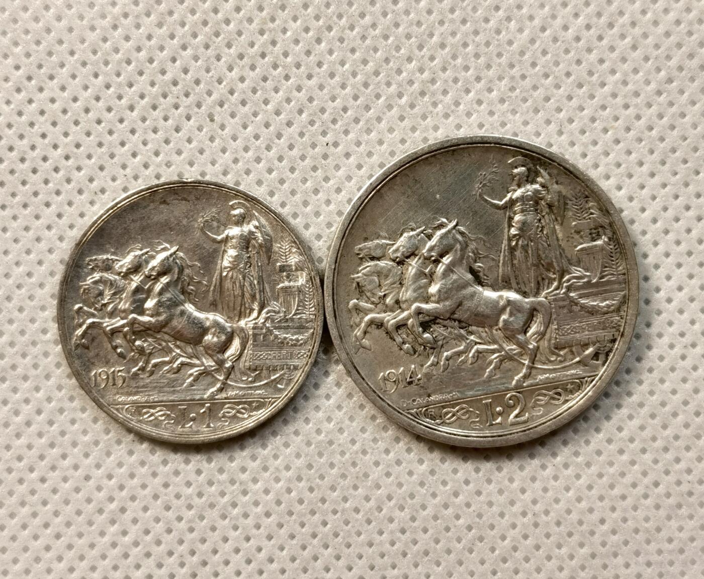 甄臻铺-世界币章拍卖（第37期），送拍享返佣金等优惠多多 意大利1915年胜利女神1里拉银币，1914年2里拉一组 好品 细节很美