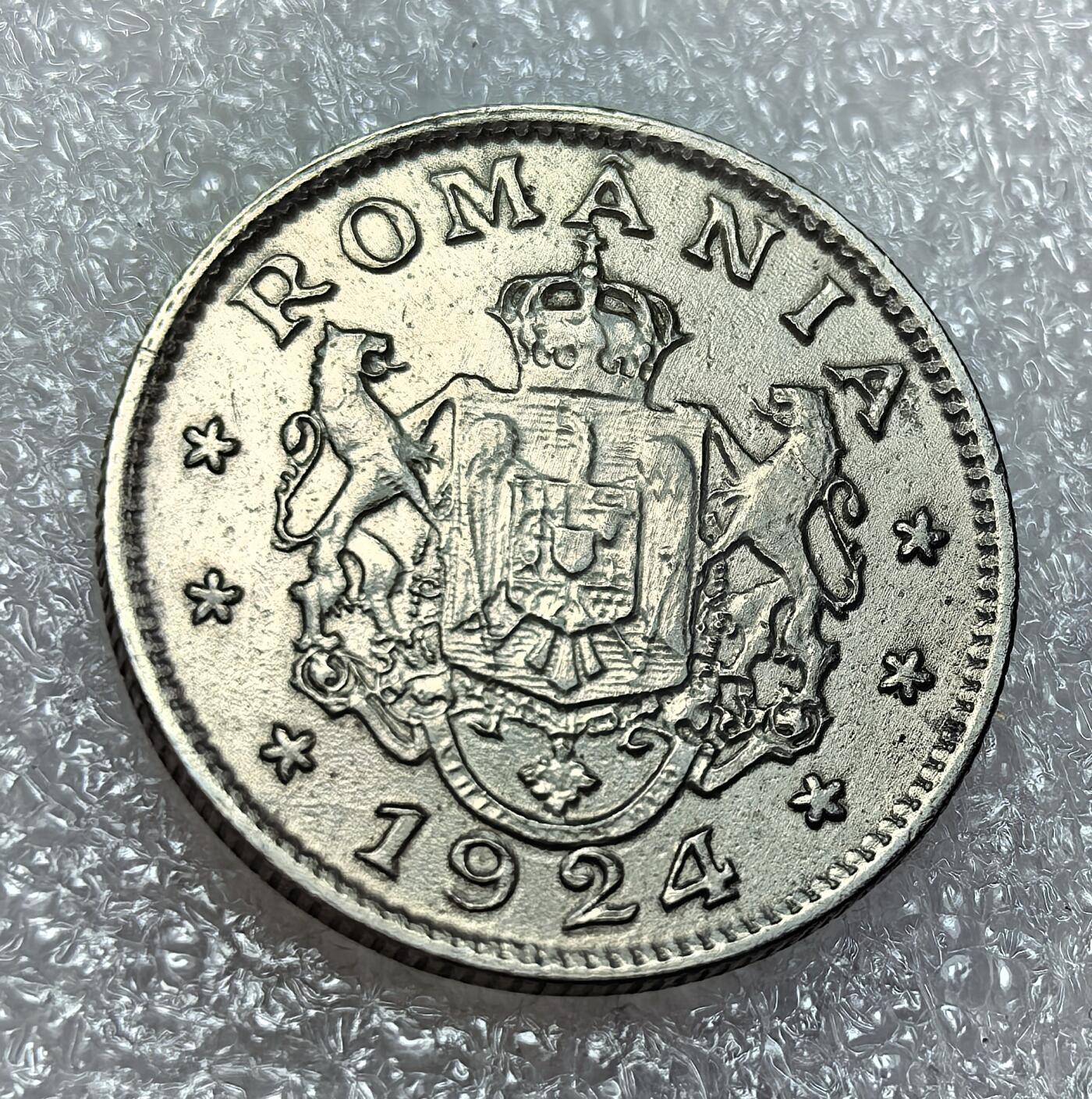 埃及、德属东非、匈牙利、葡萄牙、沙俄古银币古铜币，周五晚上九点倒数截拍，满百包邮，可寄存半年，喜欢朋友微信扫描二维码可直接参拍 罗马尼亚1924年1列伊km46