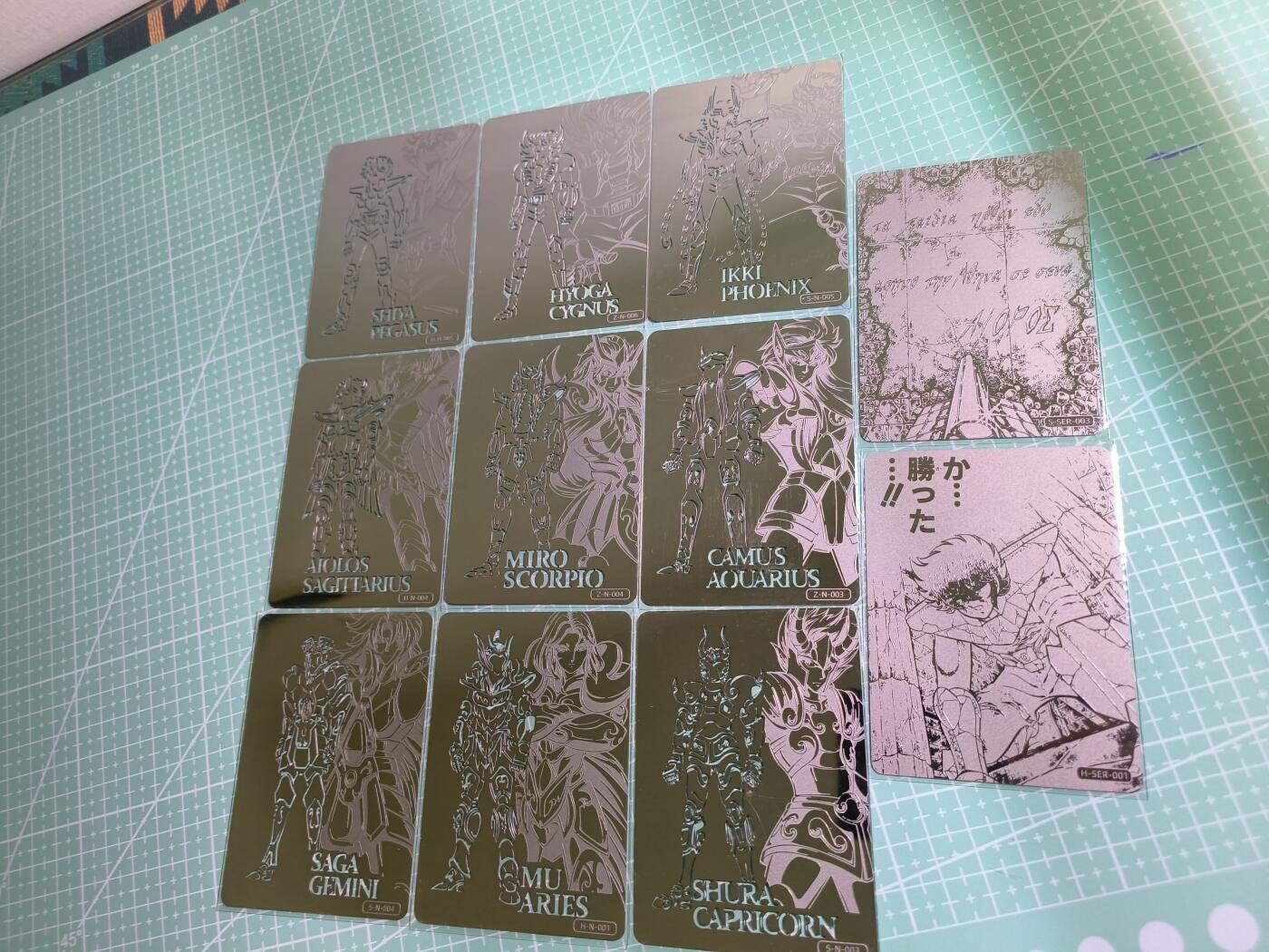 C先生卡牌 第15期 元集纪·刷子签·罐儿签·毒瘤签(持续收拍品中...) 【金属卡】阿里鱼《圣斗士星矢》镜面镂空9张+2张场景 共11张(拍的是背面，正面太亮了反光)