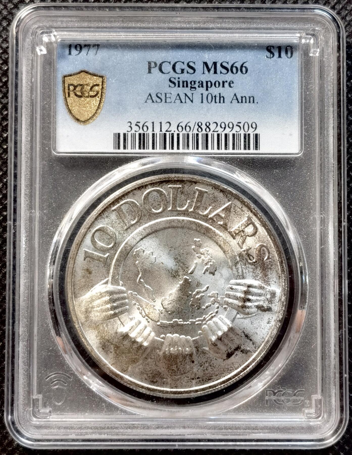 甄臻铺-世界币章拍卖（第37期），送拍享返佣金等优惠多多 PCGS-MS66 新加坡1977年10元精制银币 转光 1967-1977纪念东盟成立10周年