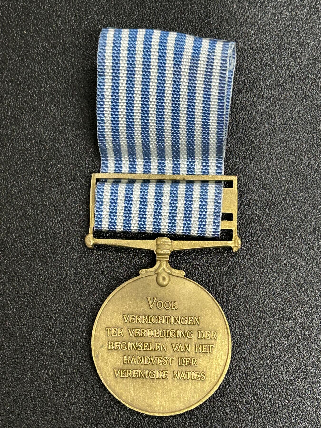 西秦中古拍卖第六十三期 不忘历史 联合国韩战奖章 少见荷兰语版