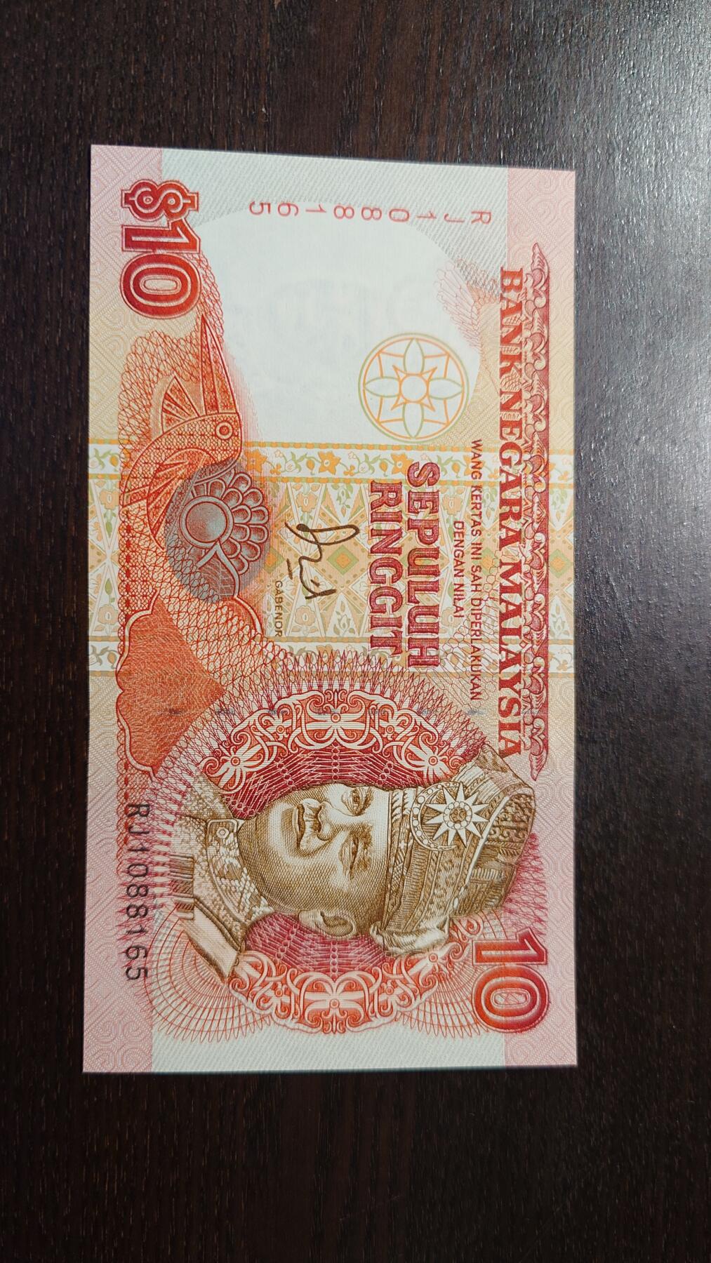 世界钱币～微拍第212期暨2025年第52期  部分库存清仓选号 80年代马来西亚10林吉特 全新绝品无4尾号179