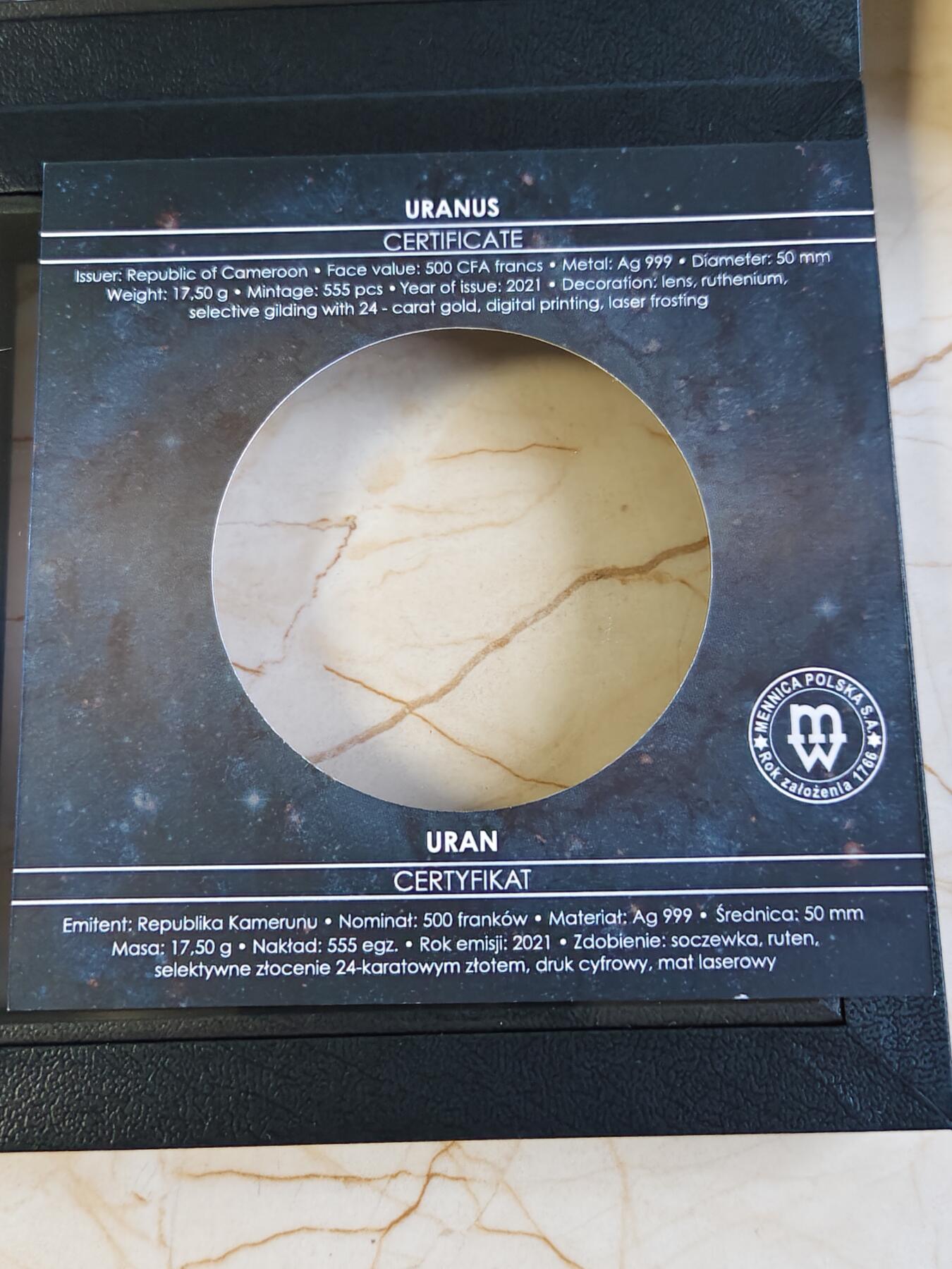 第180期拍卖【长期征集拍品】【北京币展专场】 喀麦隆2021年太阳系系列天王星钌化镀金彩印银币，有氧化，17.5克，999银，发行555枚