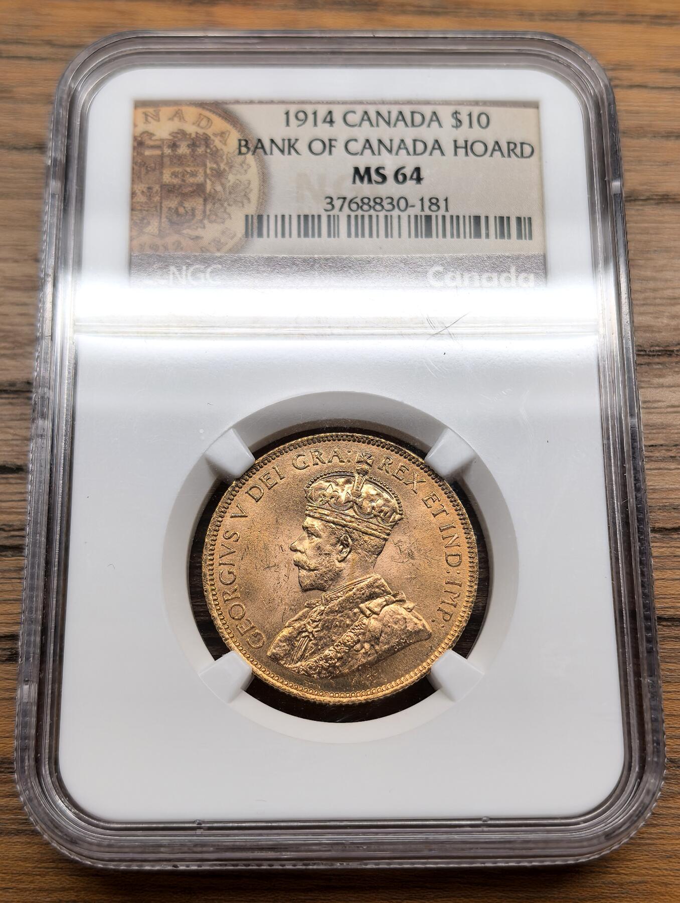 凡希社世界钱币微拍第三百十三期 1914加拿大自治领乔五10元金币NGC-MS64，源自加拿大国家银行库存，枫叶与联邦盾徽，状态一流的收藏级品相，15.72g，900金。