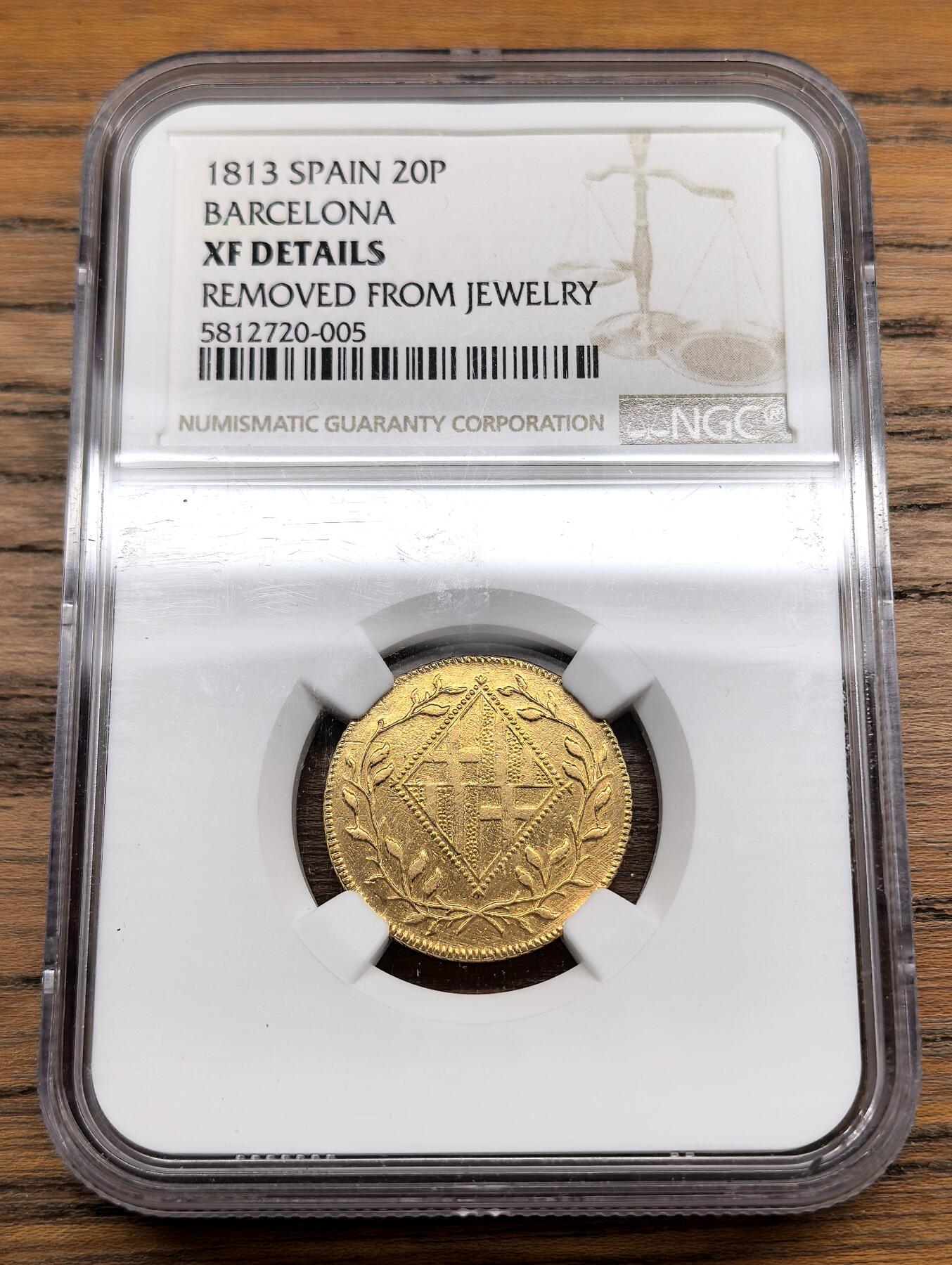 凡希社世界钱币微拍第三百十三期 1813西班牙巴塞罗那20比塞塔金币NGC-XFD，珍稀，拿破仑战争时期铸造，发行三年，1814费七复辟后熔毁很多，饰品取下，整体细节上佳。