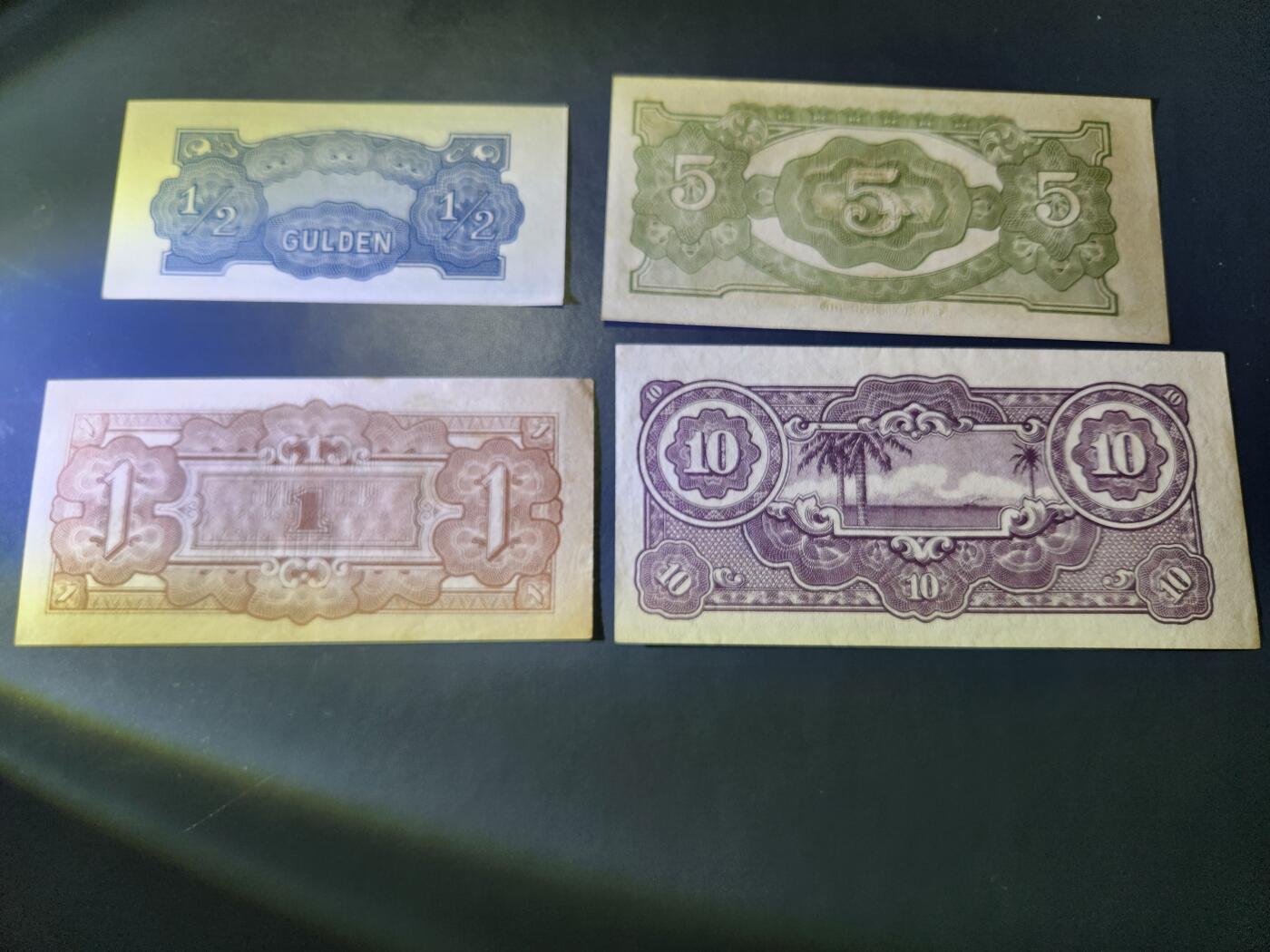 11月1号晚上8点 外国纸币自动截拍第50场 日占荷属东印度1/2，1，5，10盾 新品一套 个别黄