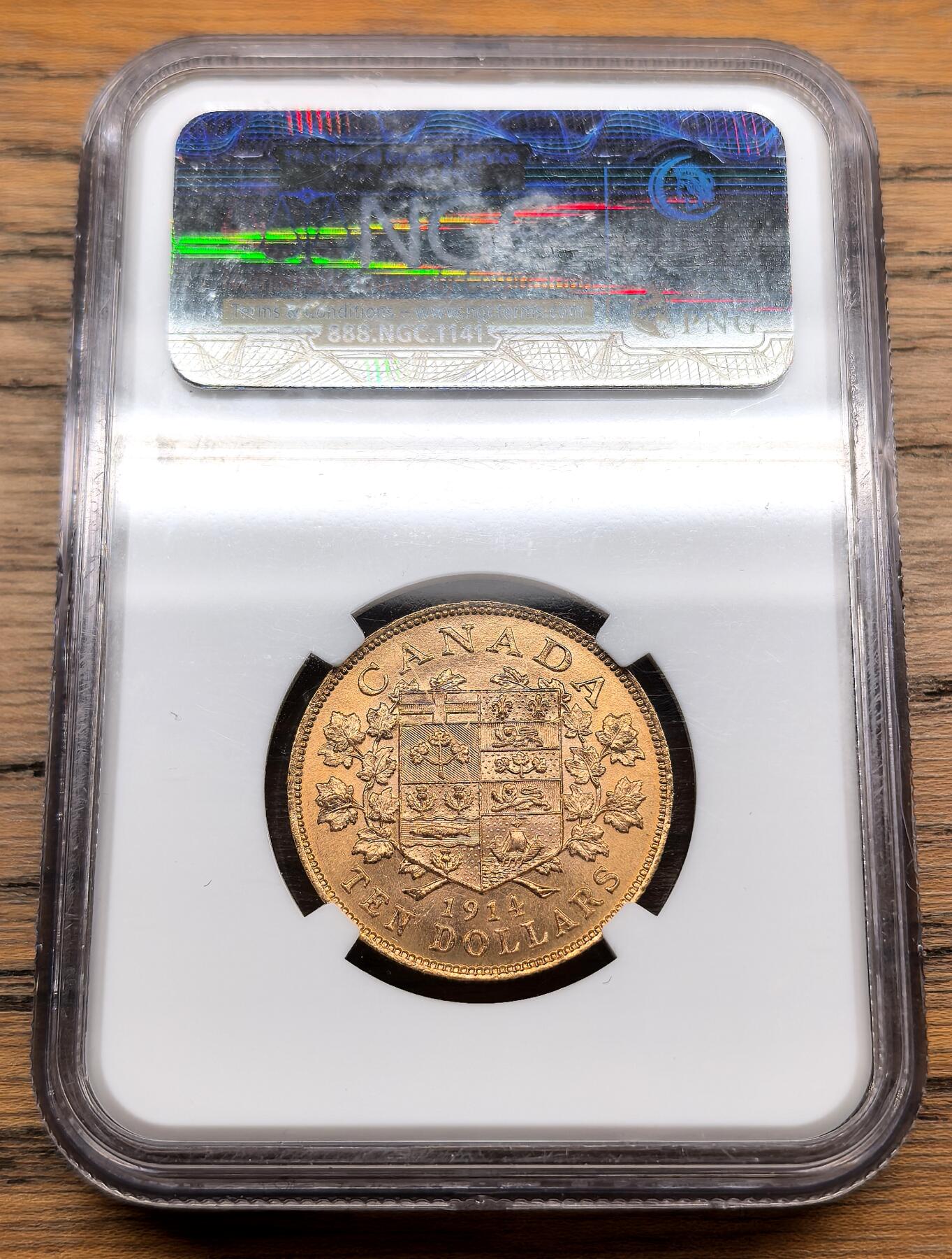 凡希社世界钱币微拍第三百十三期 1914加拿大自治领乔五10元金币NGC-MS64，源自加拿大国家银行库存，枫叶与联邦盾徽，状态一流的收藏级品相，15.72g，900金。
