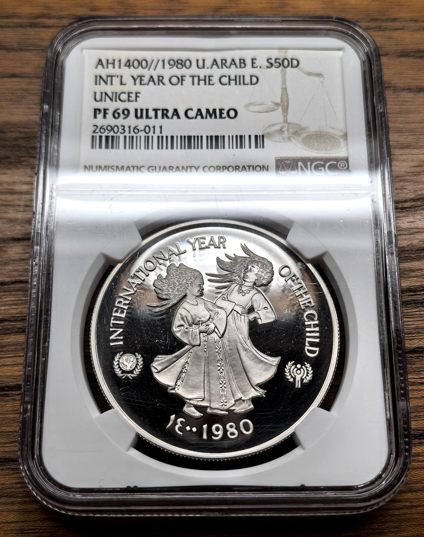 凡希社世界钱币微拍第三百十三期 1980阿联酋儿童年50D纪念大银精铸NGC-PF69UC
