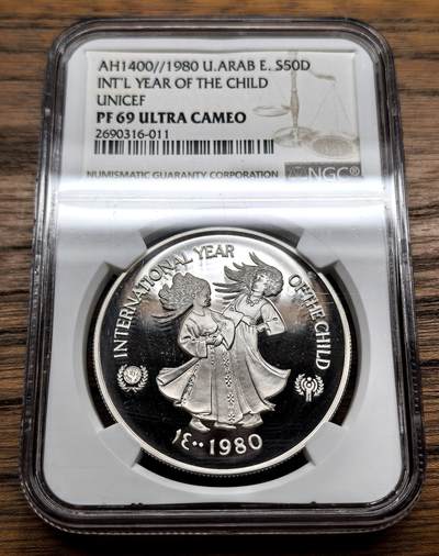 凡希社世界钱币微拍第三百十三期 - 1980阿联酋儿童年50D纪念大银精铸NGC-PF69UC