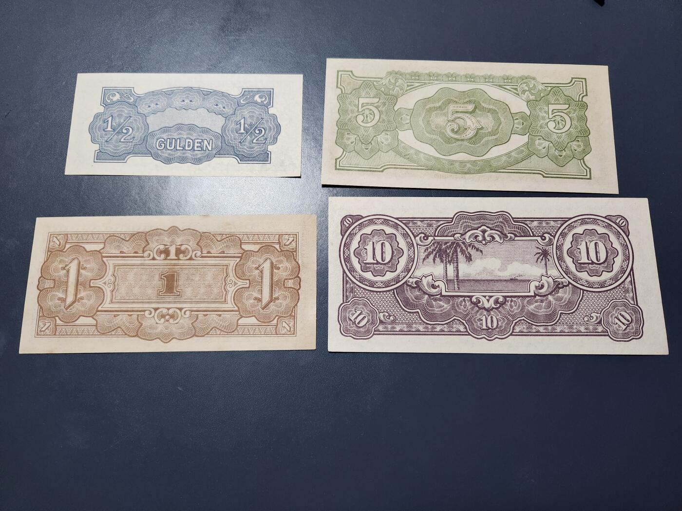 11月1号晚上8点 外国纸币自动截拍第50场 日占荷属东印度1/2，1，5，10盾 新品一套 个别黄