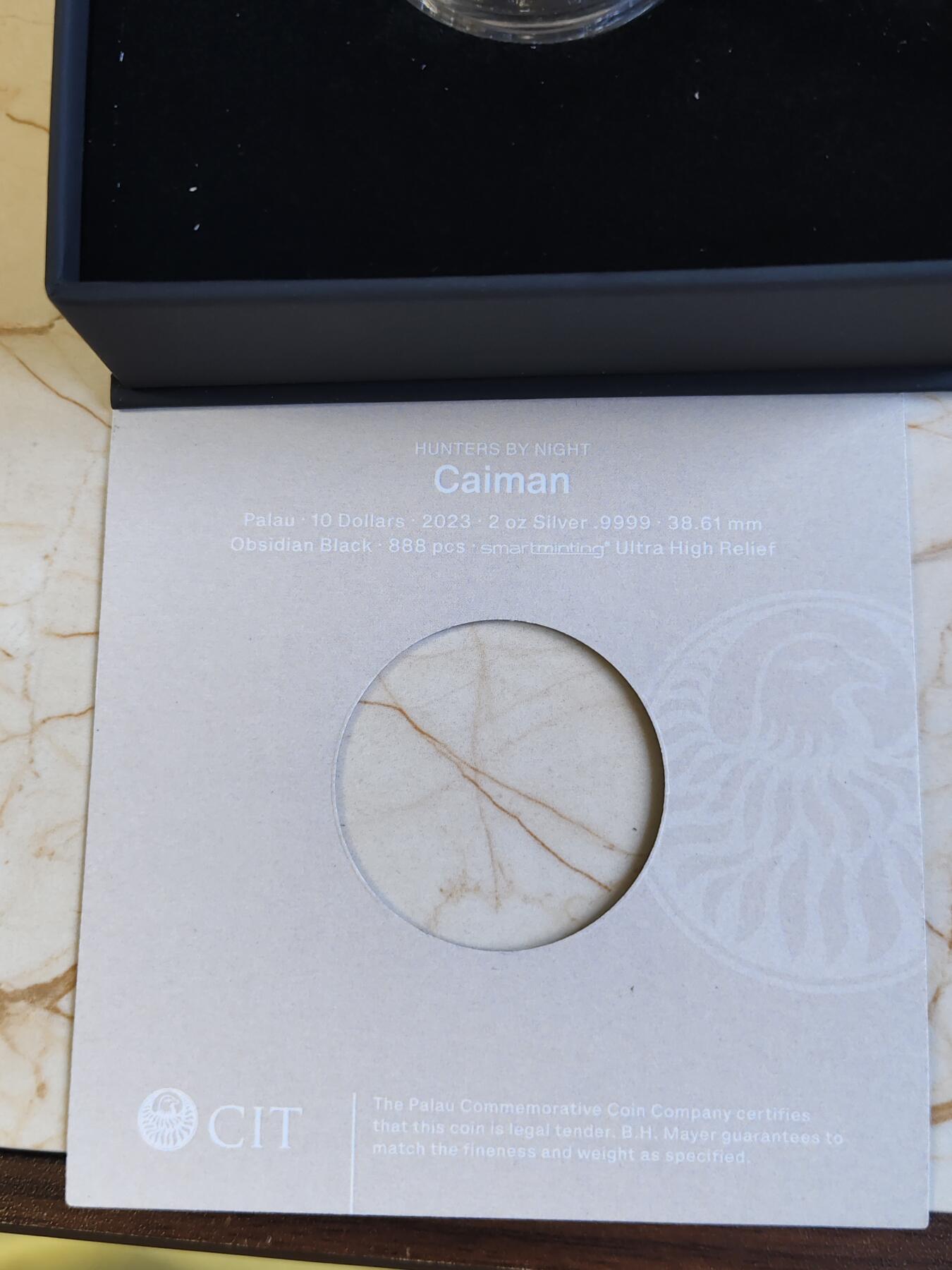 第180期拍卖【长期征集拍品】【北京币展专场】 帕劳2023年夜间猎人系列凯门鳄曜石黑2盎司彩银币，9999银，发行量888枚