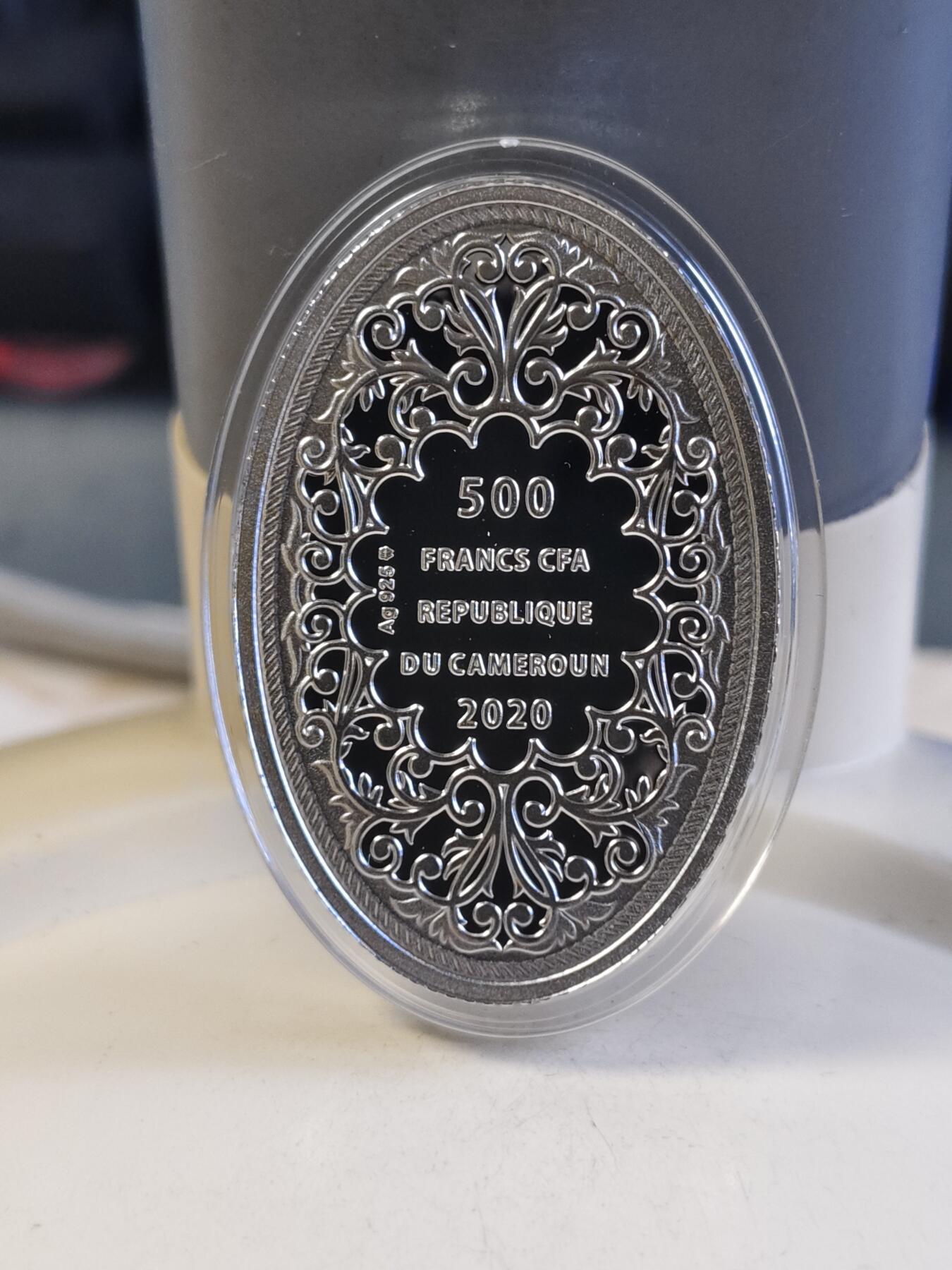 第180期拍卖【长期征集拍品】【北京币展专场】 喀麦隆2020年爱之天使彩印椭圆形精制纪念银币，999银，10克，发行999枚