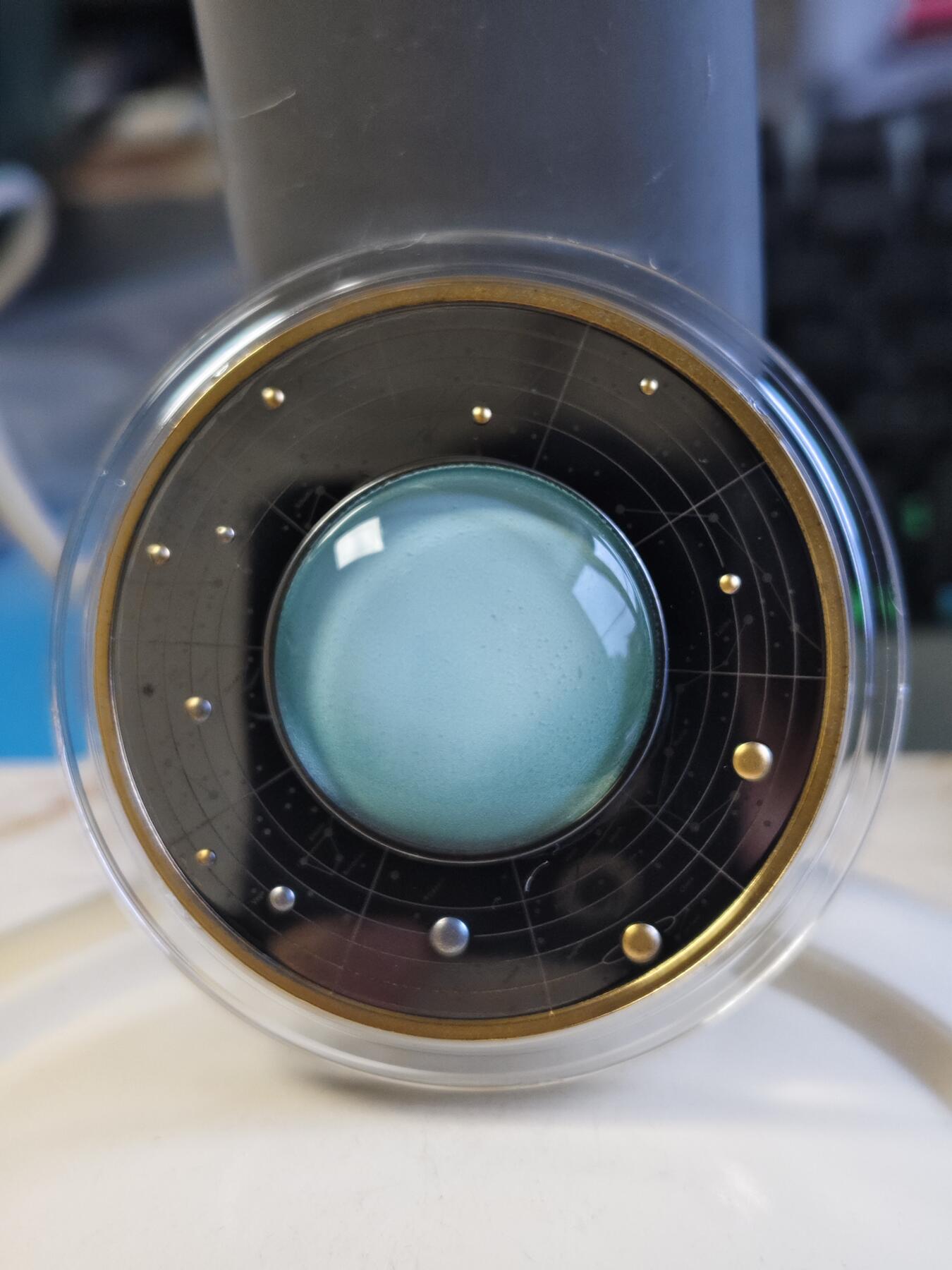 第180期拍卖【长期征集拍品】【北京币展专场】 喀麦隆2021年太阳系系列天王星钌化镀金彩印银币，有氧化，17.5克，999银，发行555枚