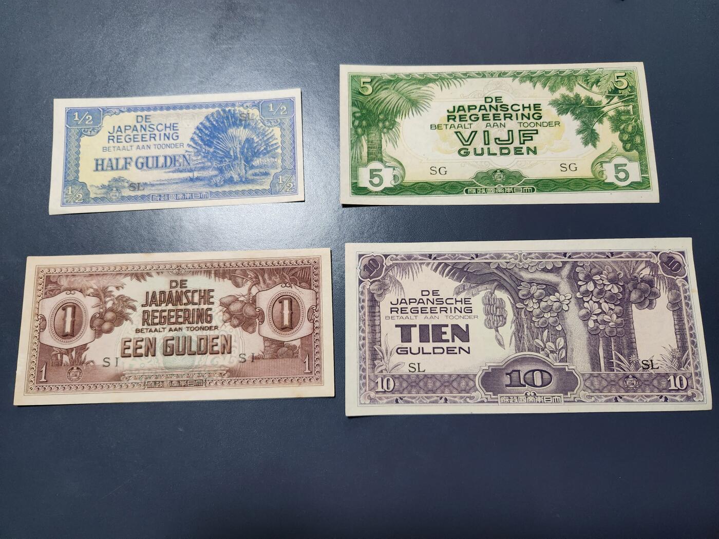 11月1号晚上8点 外国纸币自动截拍第50场 日占荷属东印度1/2，1，5，10盾 新品一套 个别黄