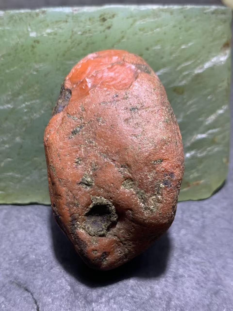 精美冰飘红皮柿子红开窗料南红玛瑙原石一颗，