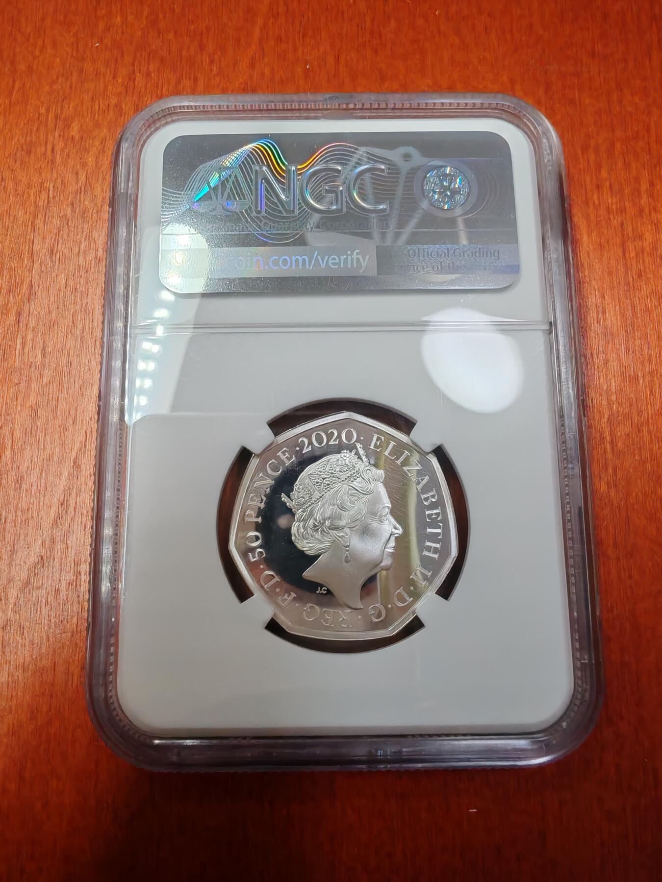 长老汇蛇年精选第六十九场拍卖 2020英国维尼熊50便士彩色精制银币，NGC PF69UC，盒证全