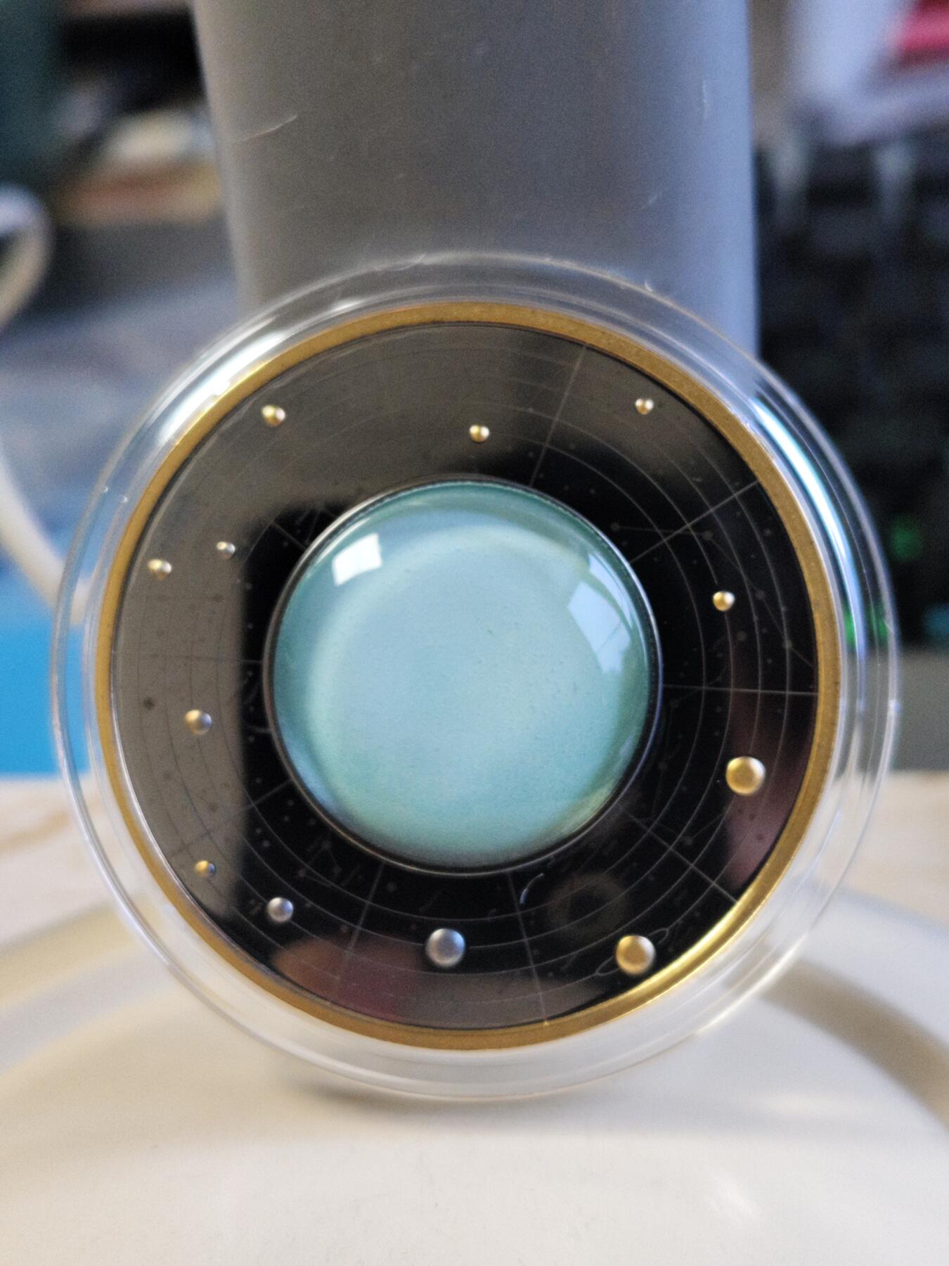 第180期拍卖【长期征集拍品】【北京币展专场】 喀麦隆2021年太阳系系列天王星钌化镀金彩印银币，有氧化，17.5克，999银，发行555枚