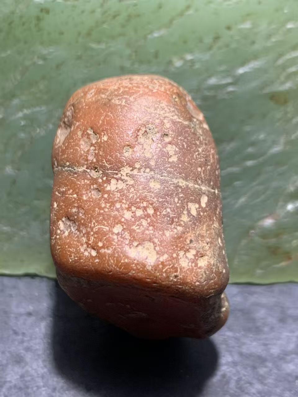 精美红皮南红玛瑙原石一颗，