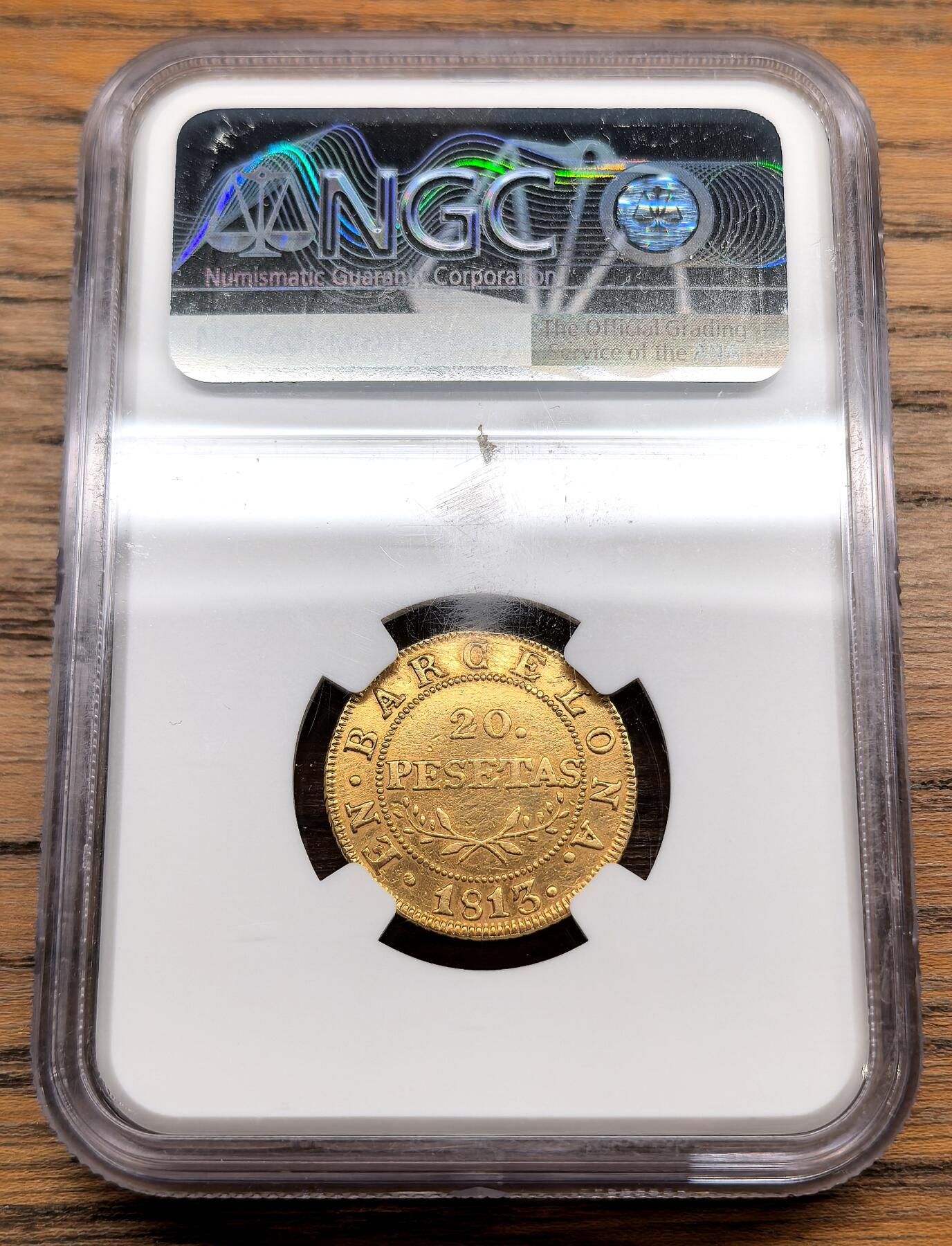 凡希社世界钱币微拍第三百十三期 1813西班牙巴塞罗那20比塞塔金币NGC-XFD，珍稀，拿破仑战争时期铸造，发行三年，1814费七复辟后熔毁很多，饰品取下，整体细节上佳。