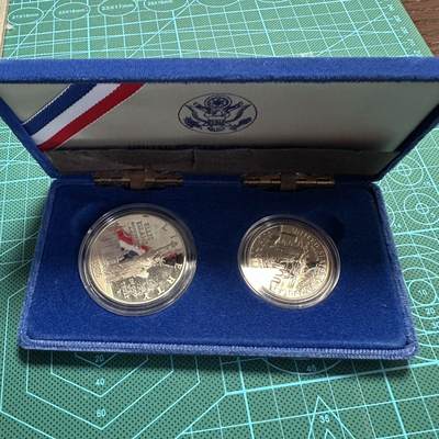 蒂克钱币-第54场 外国精品套币 银币专场 - 美国1986年美国自由女神像与埃利斯岛精制纪念币 1美元为银币 半美元为镍币