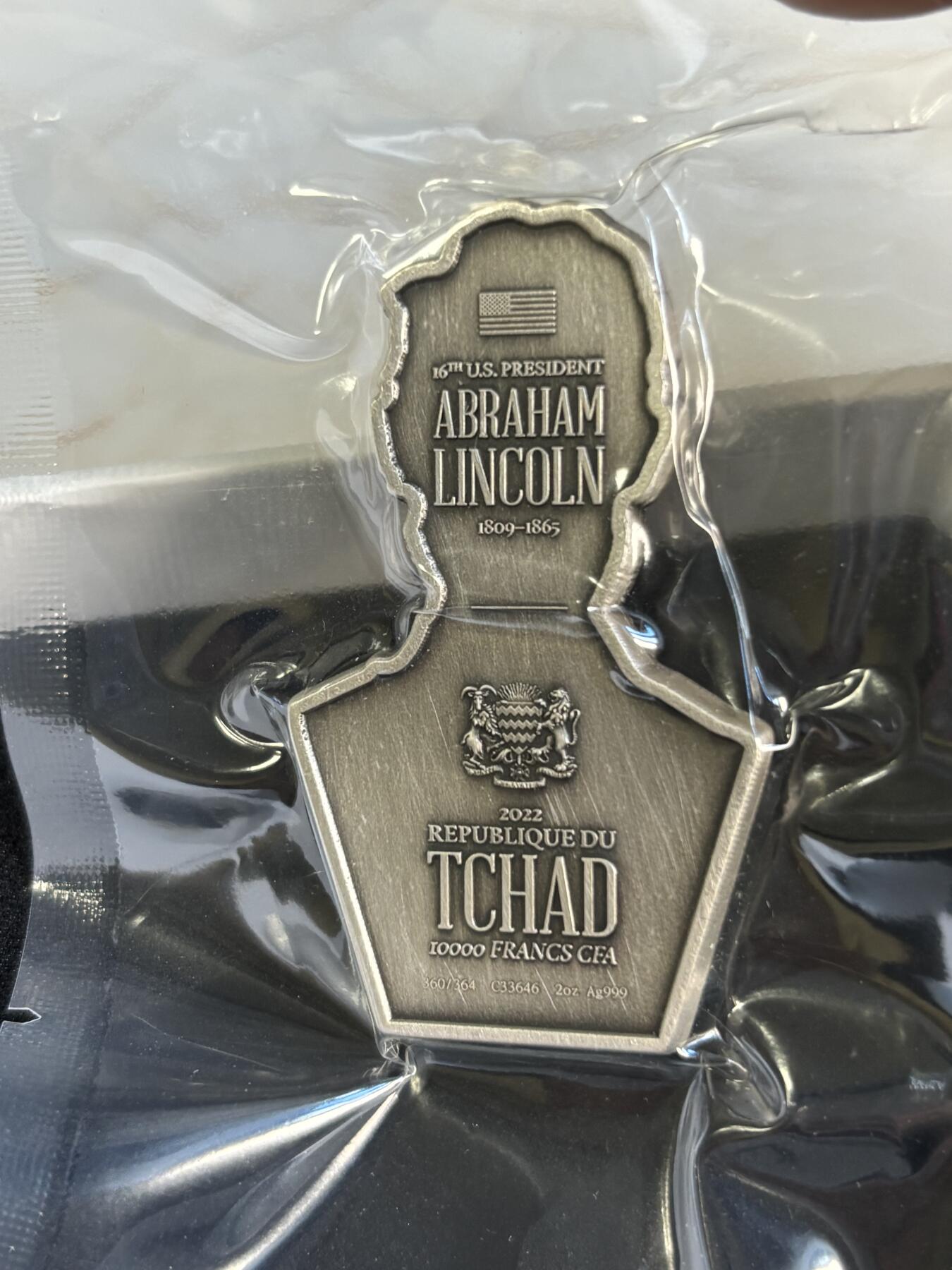 第180期拍卖【长期征集拍品】【北京币展专场】 乍得 2022 年美国第 16 任总统2盎司异形仿古银币，999银，发行364枚