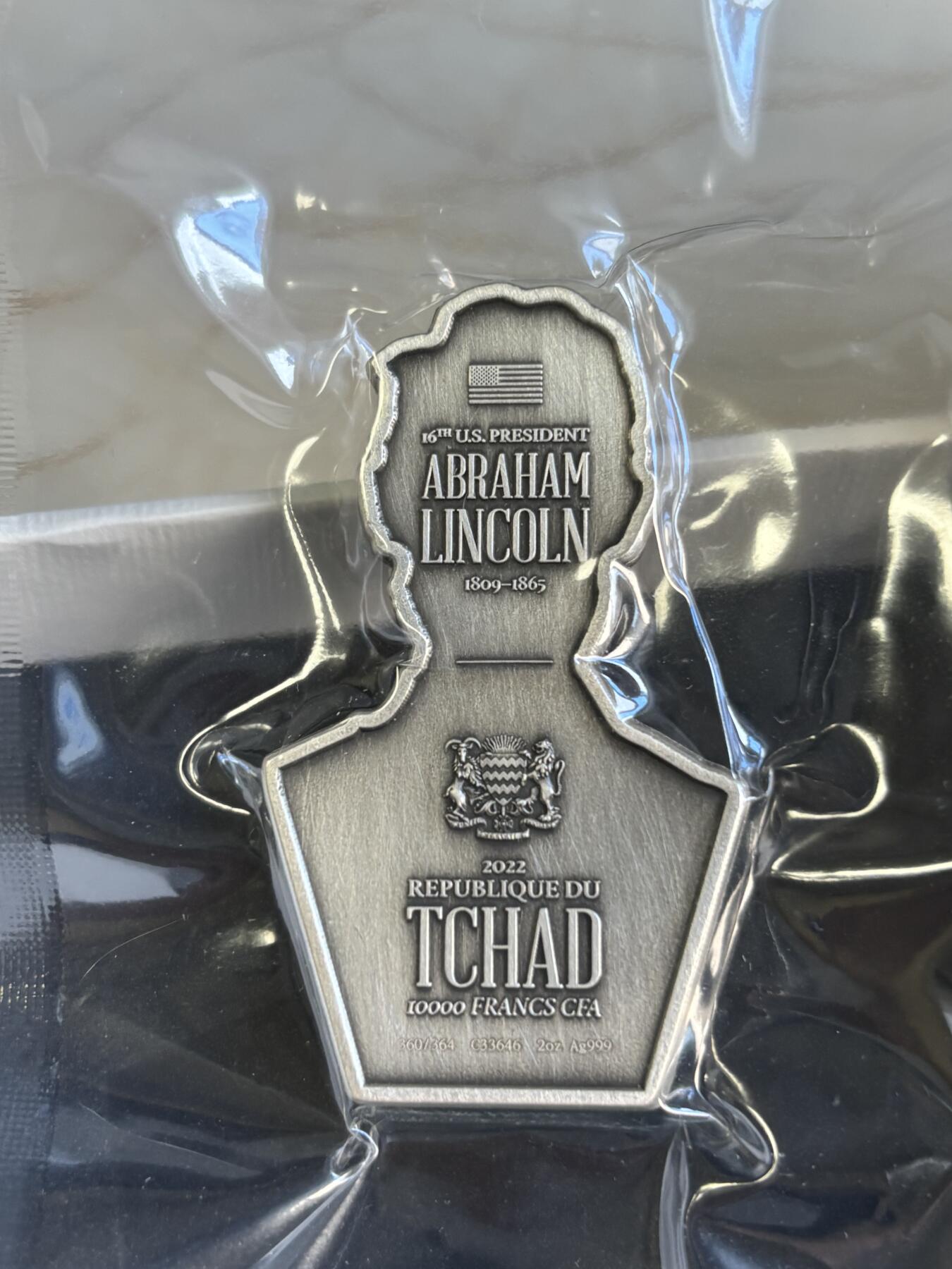 第180期拍卖【长期征集拍品】【北京币展专场】 乍得 2022 年美国第 16 任总统2盎司异形仿古银币，999银，发行364枚
