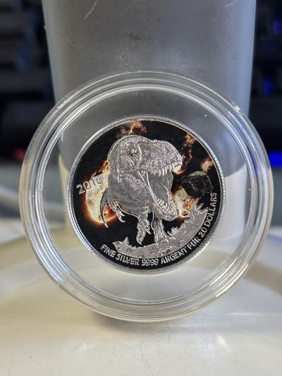第180期拍卖【长期征集拍品】【北京币展专场】 - 加拿大2016年恐龙镶嵌陨石7.96克纪念银币，9999银，发行1000枚