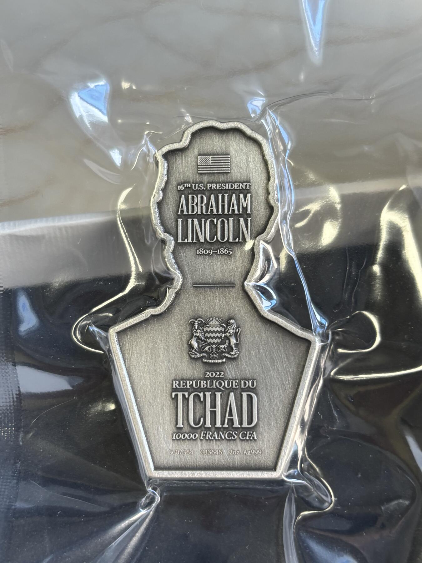 第180期拍卖【长期征集拍品】【北京币展专场】 乍得 2022 年美国第 16 任总统2盎司异形仿古银币，999银，发行364枚