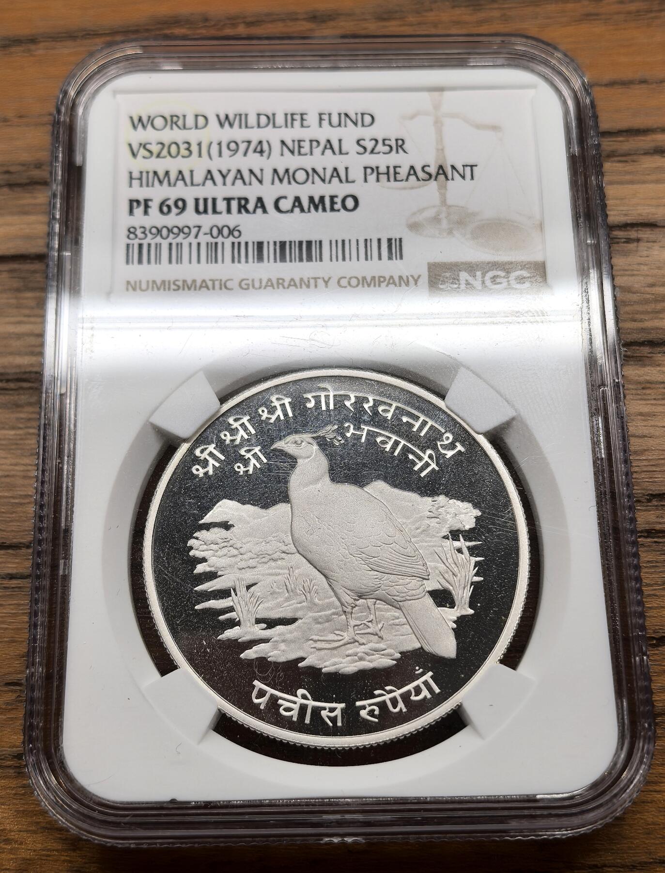 凡希社世界钱币微拍第三百十三期 1974尼泊尔喜马拉雅虹稚25卢比大银精铸NGC-PF69UC