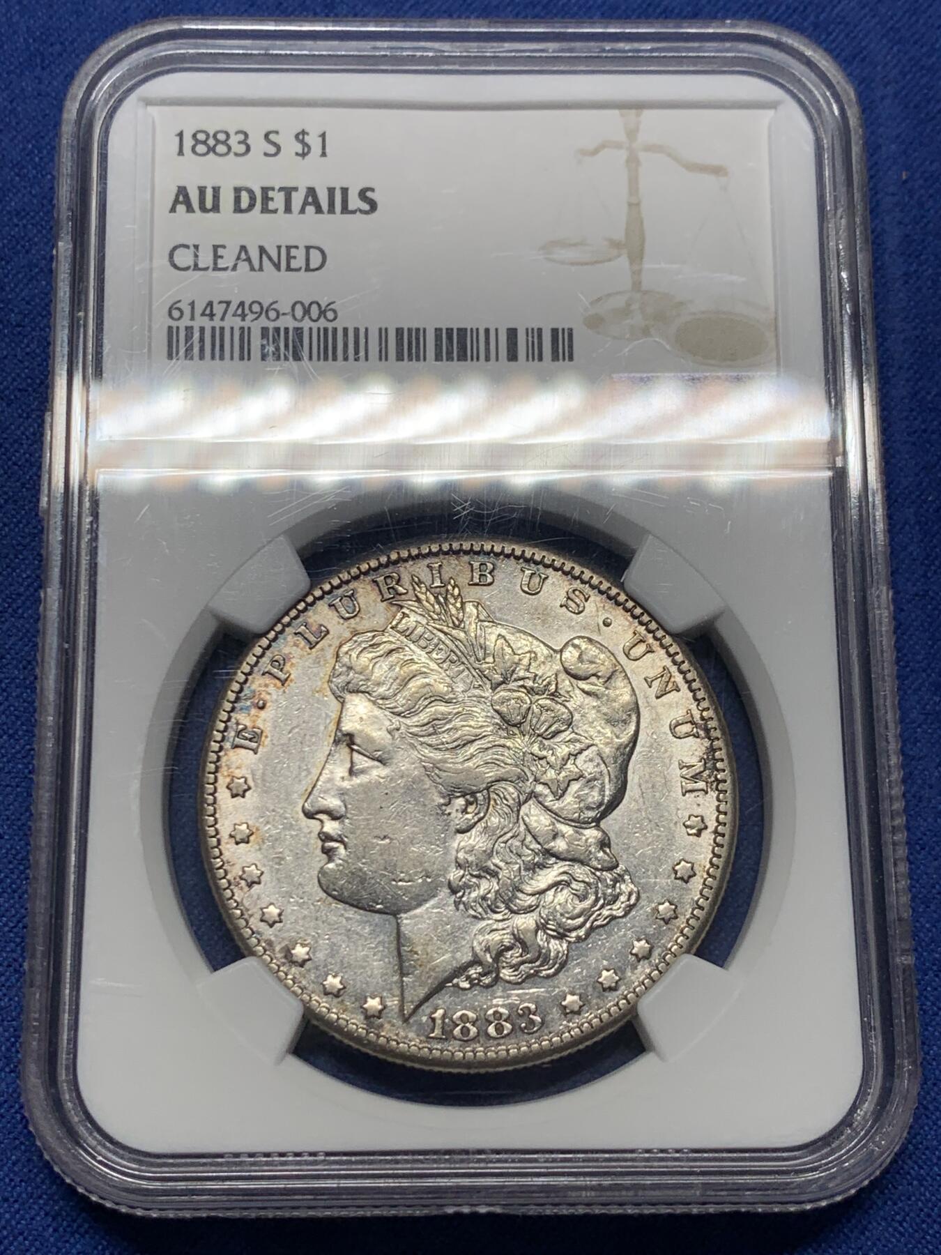 《竞宝斋》第434场 周日，周一2场连拍 （全场包邮） NGC AUD 1883年S厂美国摩根银币 罕见摩根，1883年摩根O厂和P厂都常见，S厂极少见，MS63白币书价2700刀，MS65白币书价42000刀，稀缺程度，可见一斑。此外该枚两面带淡金彩，更加难得