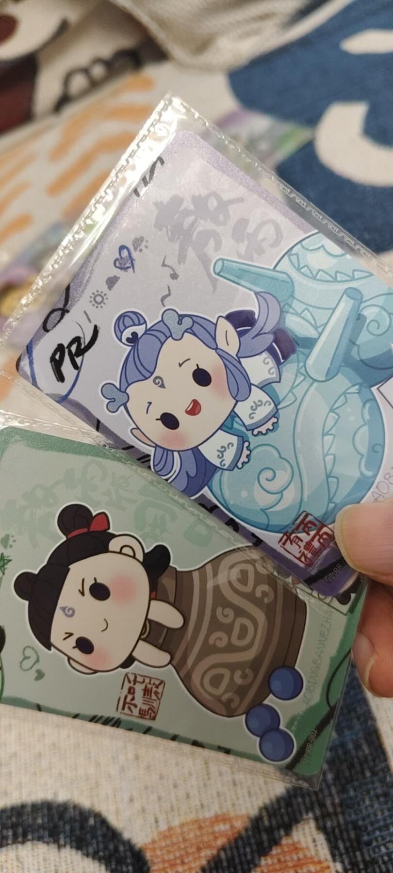 秋原瞳的小店第二十七期（持续收拍，11月秋意正浓，冬欲近，暖心囤卡好时光） 卡游哪吒主角团一对活动卡，实物很好看