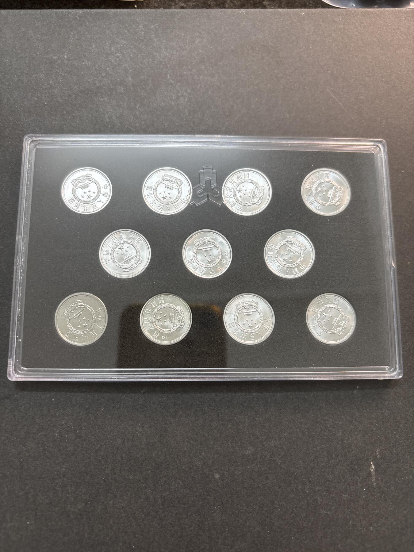 文馨钱币收藏第 278 场，银元，纸币，铜章场 长期接收代拍品 全新带册子未流通 2005-2017 年 1 分 10 枚一册