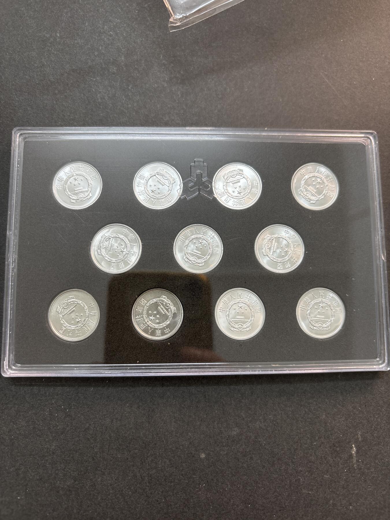 文馨钱币收藏第 278 场，银元，纸币，铜章场 长期接收代拍品 全新带册子未流通 2005-2017 年 1 分 10 枚一册